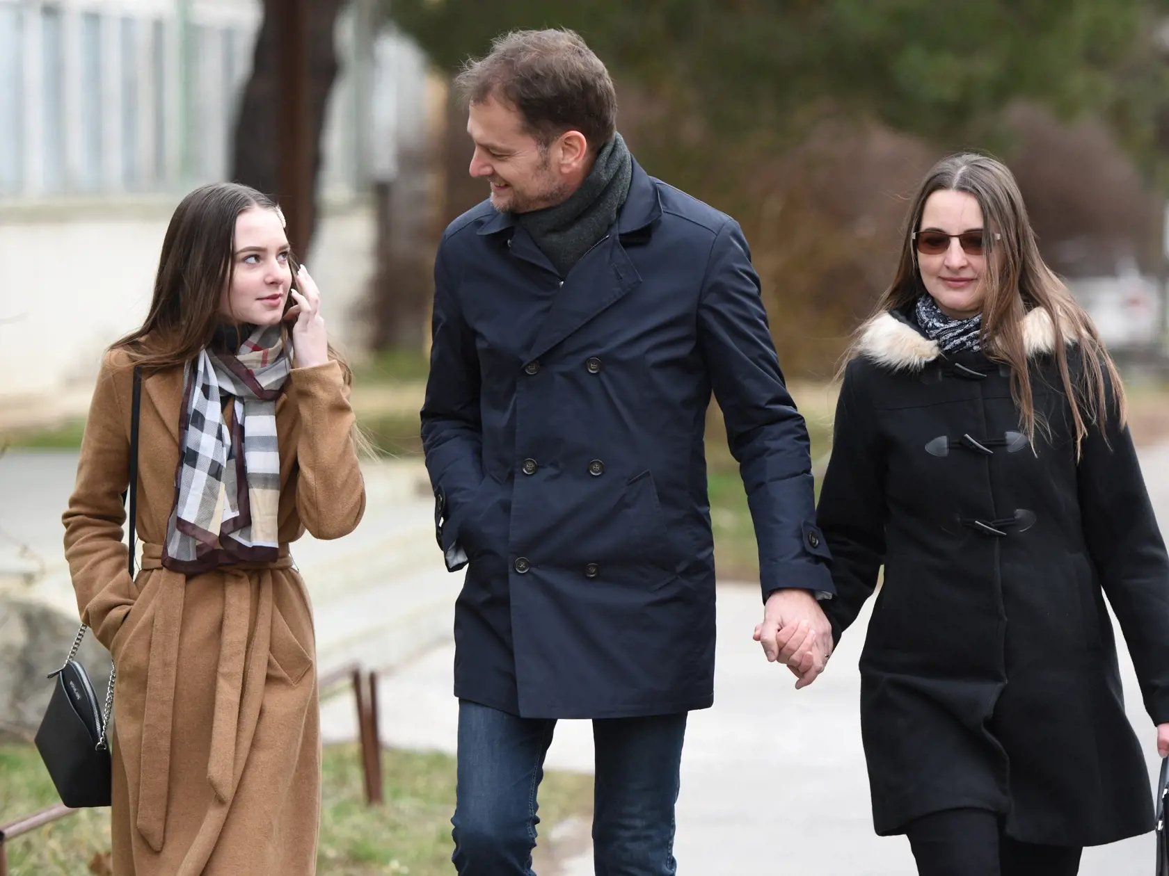 Na snímke zľava dcéra Igora Matoviča Klára, Igor Matovič a jeho žena Pavlína prichádzajú do volebnej miestnosti vo voľbách do Národnej rady SR v Trnave 29. februára 2020. FOTO TASR - Lukáš Grinaj
