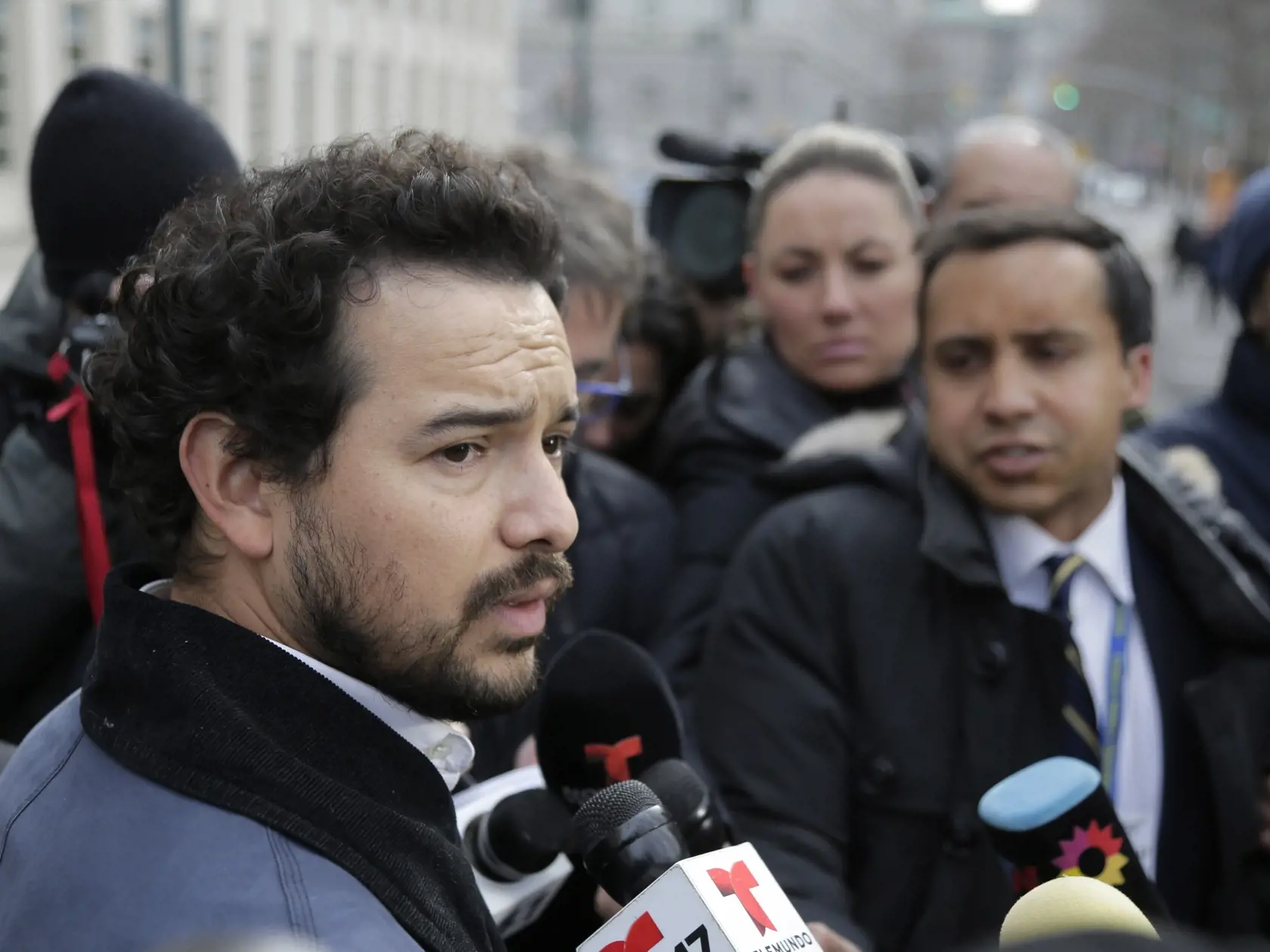 Actor Alejandro Edda talks to reporters outside federal court in the Brooklyn borough of New York, Monday, Jan. 28, 2019. The actor, who portrayed the notorious drug lord El Chapo on a Netflix series, appeared at the kingpin's trial. (AP Photo/Seth Wenig)
