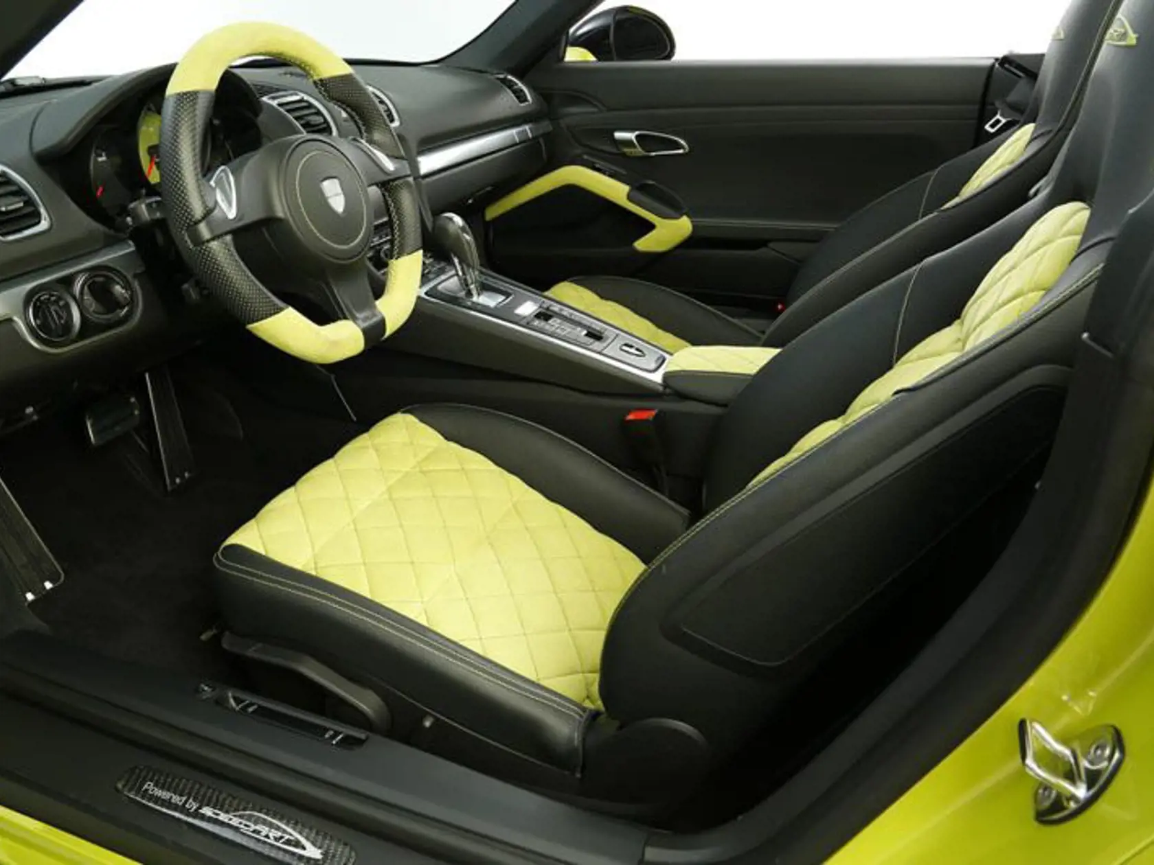 Boxster obliekli do divokej zeleno-čiernej kombinácie