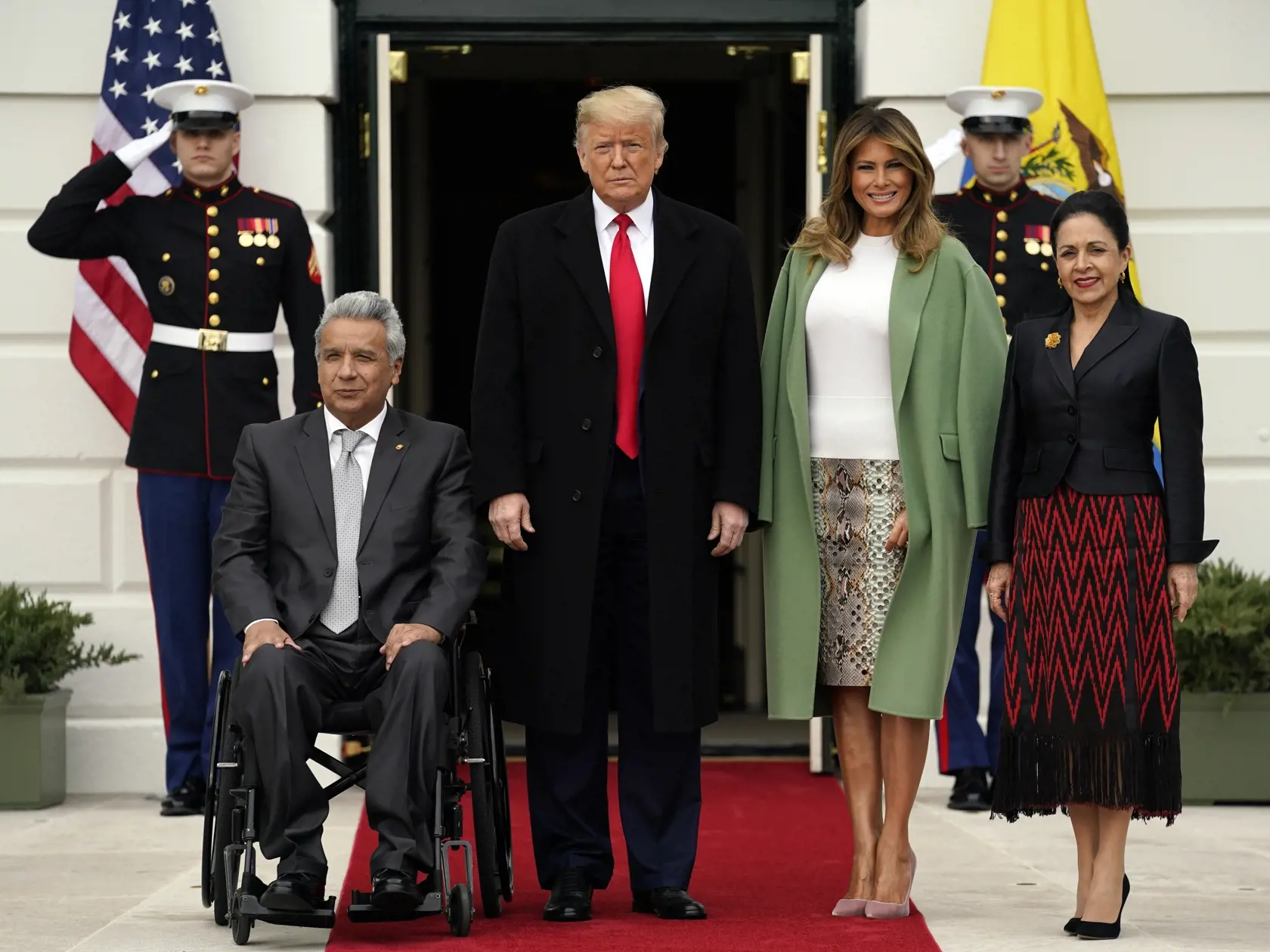EBE 32 Washington - Na snímke zľava ekvádorský prezident Lenín Moreno, americký prezident Donald Trump, prvá dáma USA Melania Trumpová a prvá dáma Ekvádoru Rocio Gonzalezová počas uvítacieho ceremoniálu v Bielom dome vo Washingtone 12. februára 2020. FOTO TASR/AP 
President Donald Trump and first lady Melania Trump welcome Ecuadorian President Lenin Moreno and his wife Rocio Gonzalez to the White House, Wednesday, Feb. 12, 2020, in Washington. (AP Photo/Evan Vucci)