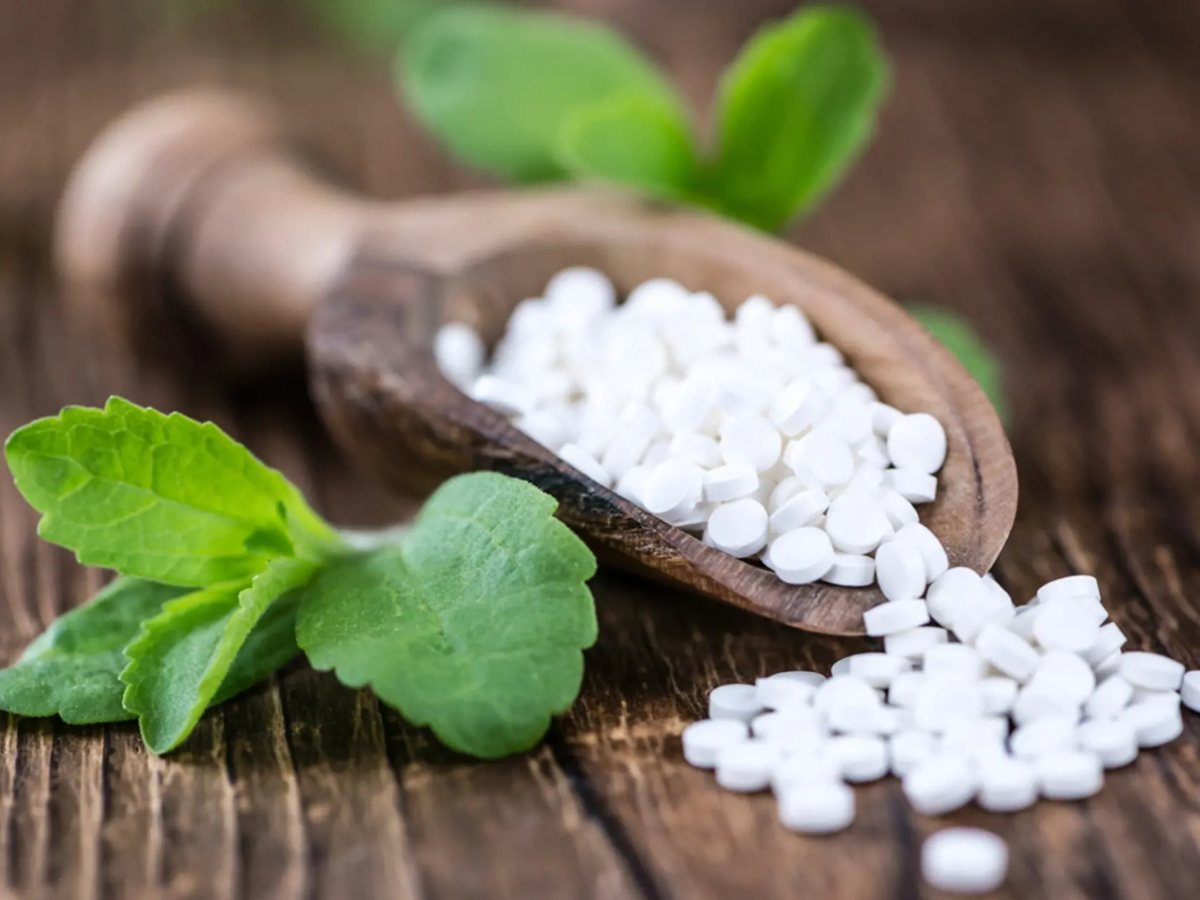 Wooden,Table,With,Stevia,Sweetener,Pills,(selective,Focus;,Close-up,Shot)