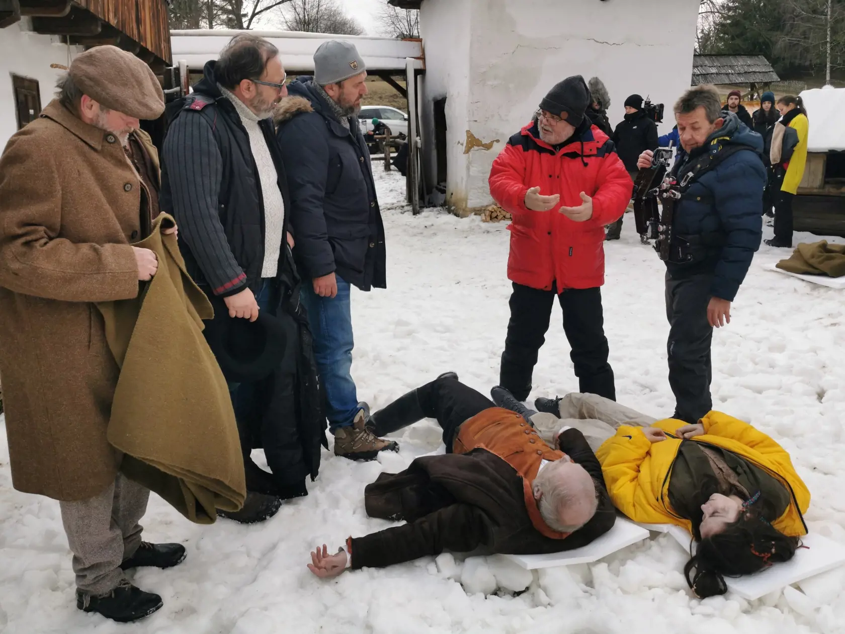 Na snímke hore druhý sprava v červenom režisér Ivo Trajkov, dole sprava herečka Judit Bárdos a herec Attila Mokoš počas nakrúcania filmu Fašiangy podľa novely Piargy od Františka Švantnera v Múzeu slovenskej dediny v Martine 17. februára 2020. FOTO TASR - Erika Ďurčová