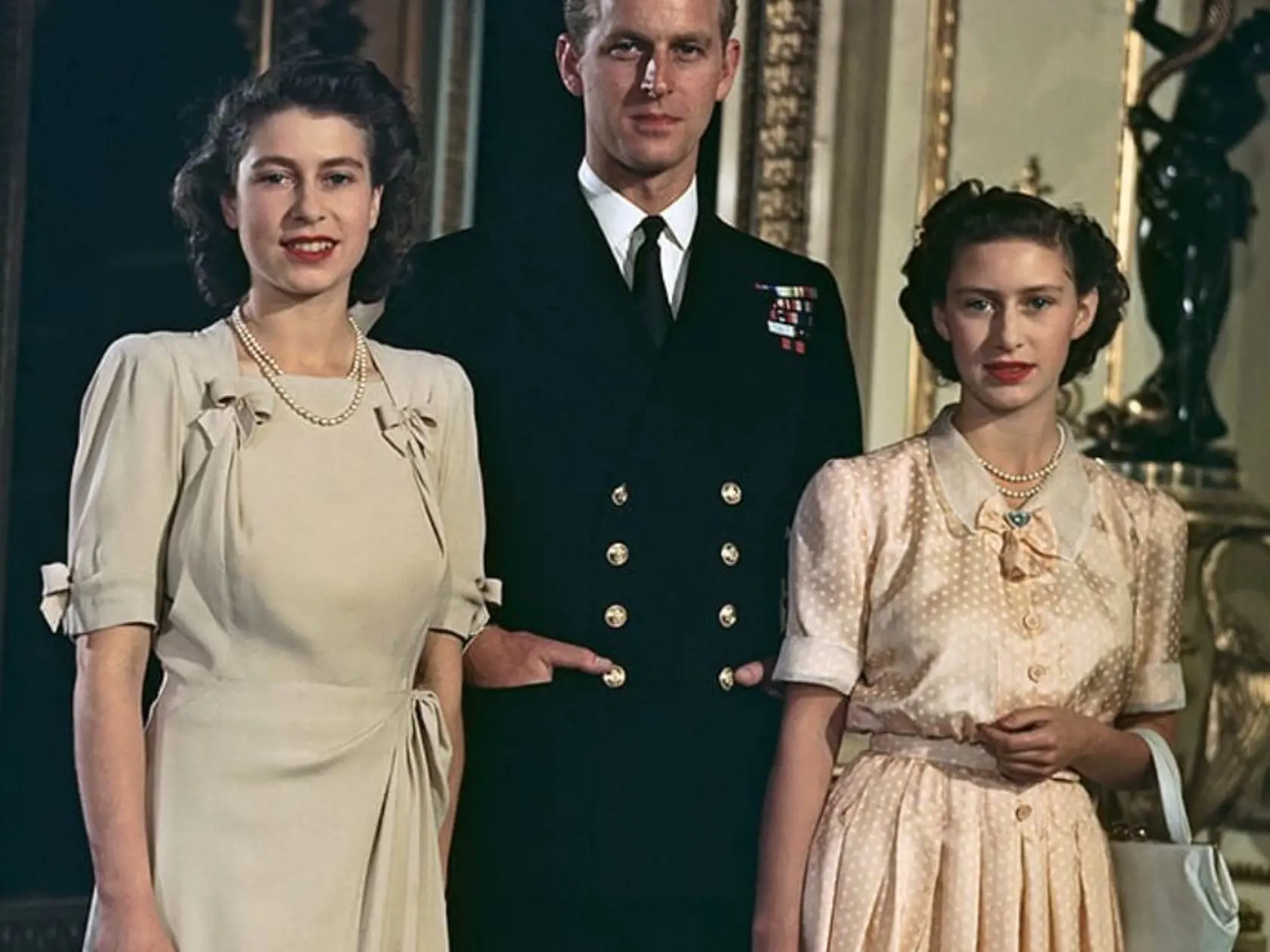 Kráľovná Alžbeta, princ Filip a princezná Margareth.