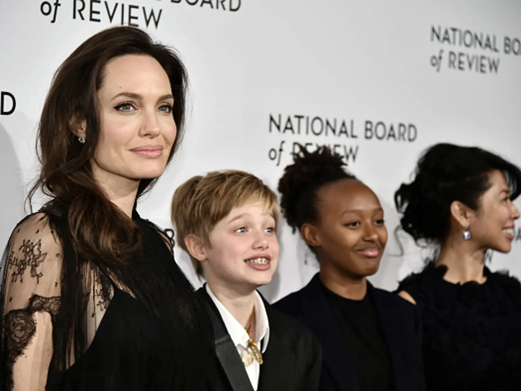 NEW YORK, NY - JANUARY 09:  Angelina Jolie, Shiloh Jolie-Pitt, Zahara Jolie-Pitt, and Loung Ung attend the 2018 The National Board Of Review Annual Awards Gala at Cipriani 42nd Street on January 9, 2018 in New York City.  (Photo by Steven Ferdman/Patrick McMullan via Getty Images)