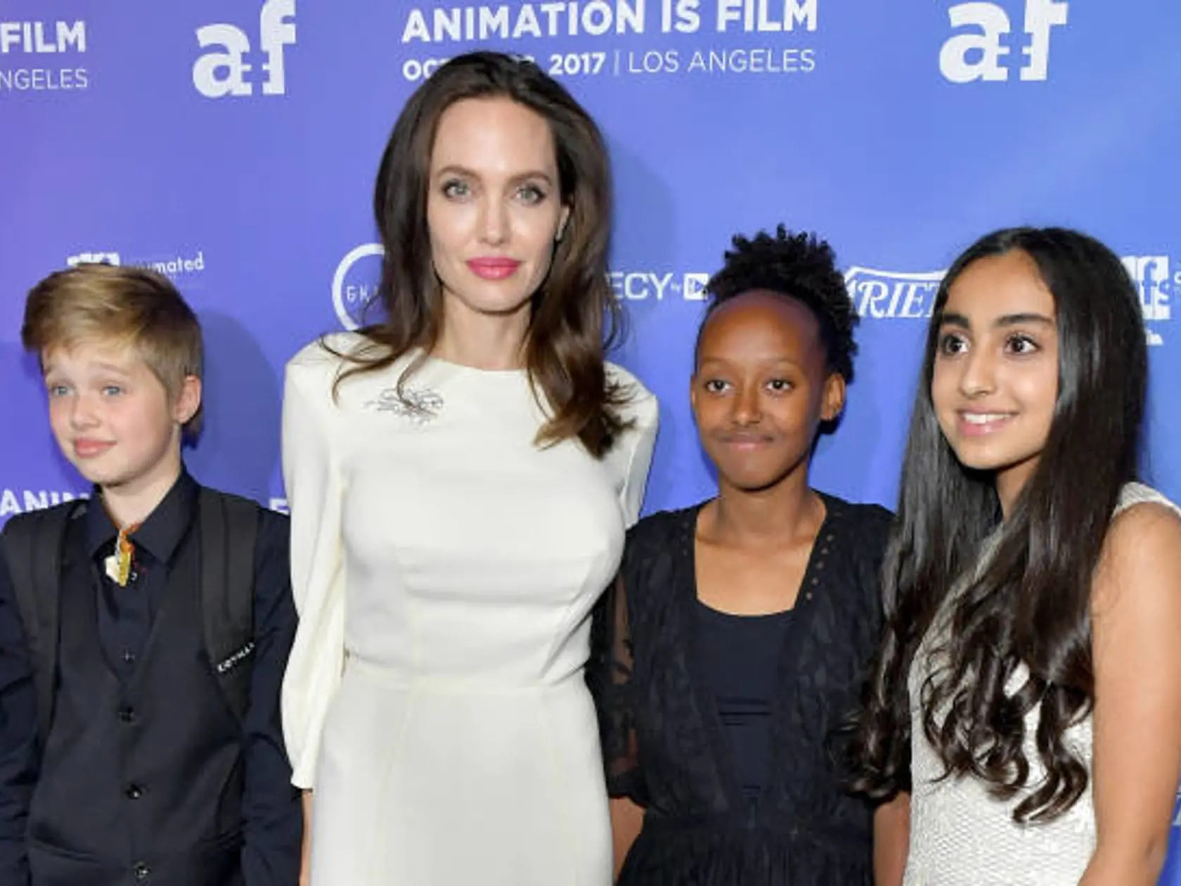 HOLLYWOOD, CA - OCTOBER 20:  Shiloh Jolie-Pitt, Angelina Jolie, Zahara Jolie-Pitt and Saara Chaudry attend the Premiere Of Gkids' "The Breadwinner" at TCL Chinese 6 Theatres on October 20, 2017 in Hollywood, California.  (Photo by Neilson Barnard/Getty Images)