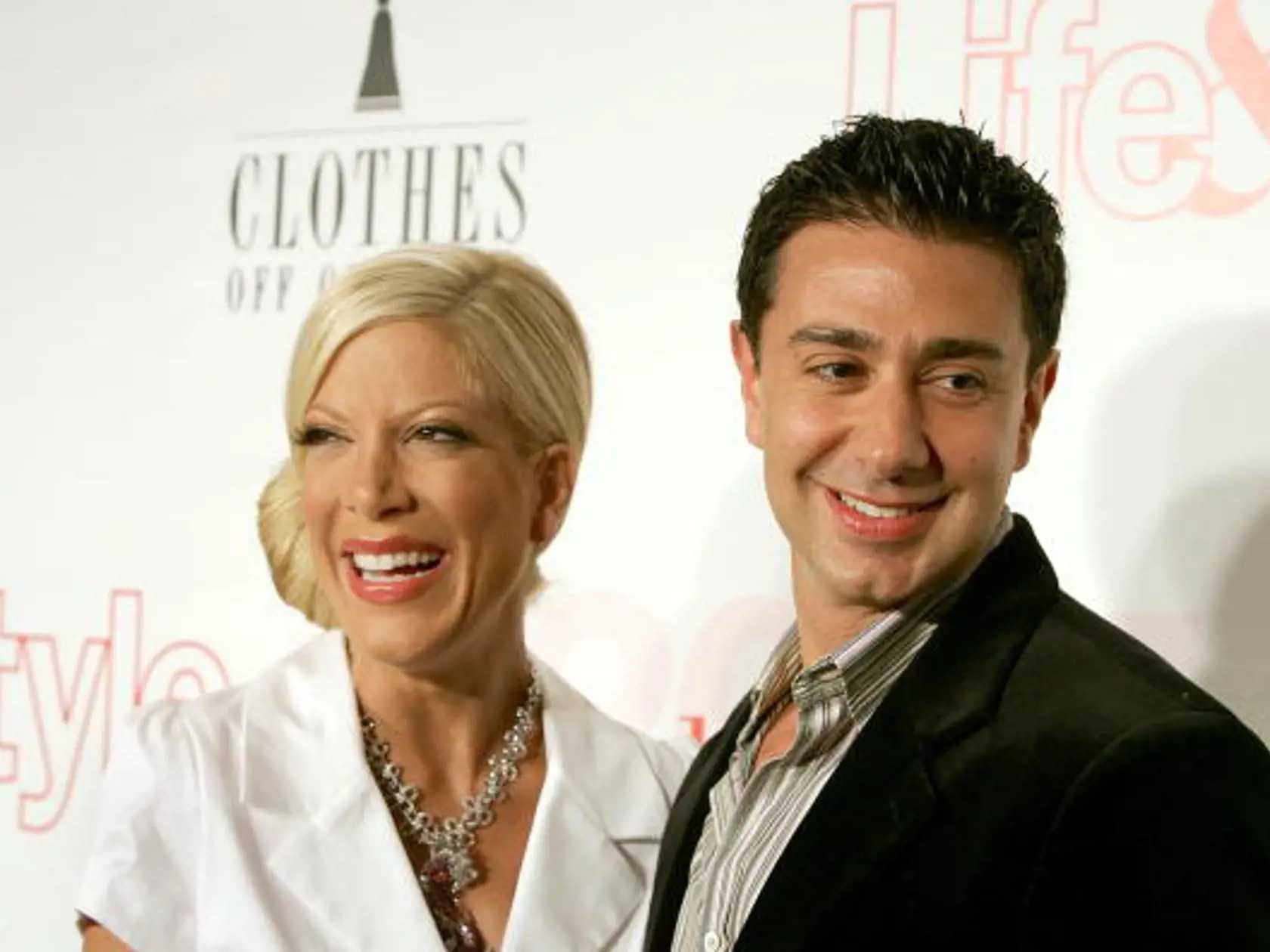HOLLYWOOD - MAY 26:  Actress Tori Spelling and her husband Charlie Shanian arrive at Life & Style Magazine's Stylemakers 2005, a runway show and charity auction held at Montmartre Lounge on May 26, 2005 in Hollywood, California. (Photo by Frazer Harrison/Getty Images)