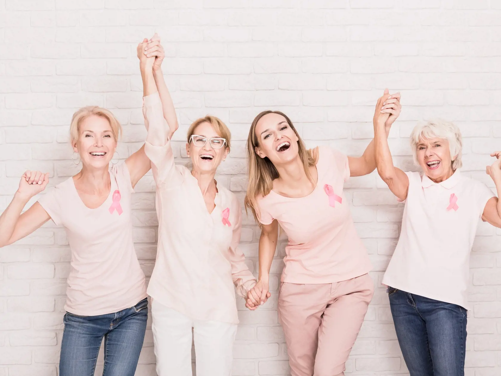 Group,Of,Smiling,Ladies,With,Pink,Ribbons,Cheering,And,Holding
