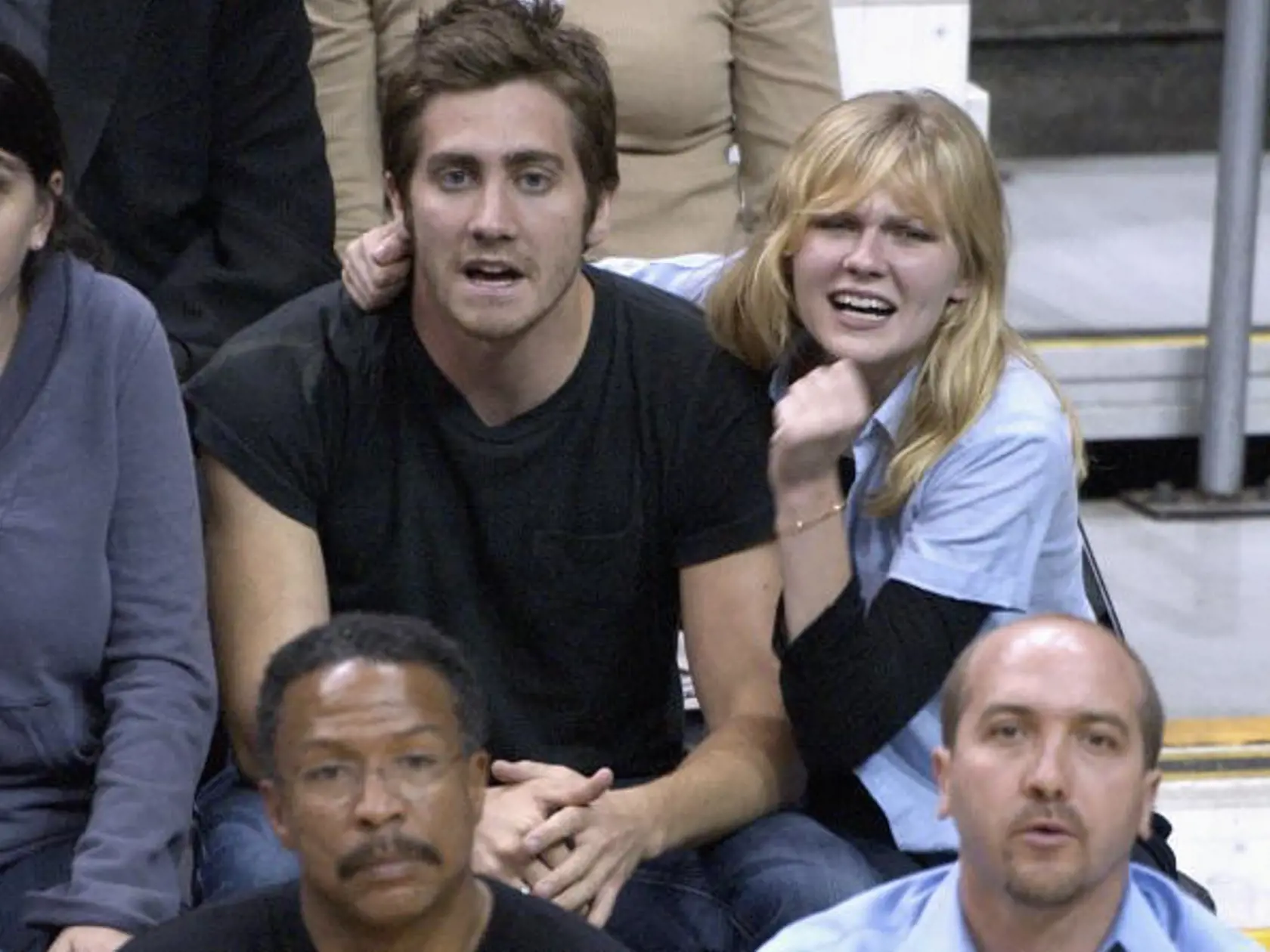LOS ANGELES - MAY 15:  Actor Jake Gyllenhaal and actress Kirsten Dunst attend the Los Angeles Lakers v. San Antonio Spurs NBA playoff game on May 15, 2003 at Staples Center in Los Angeles, California. (Photo by Vince Bucci/Getty Images)