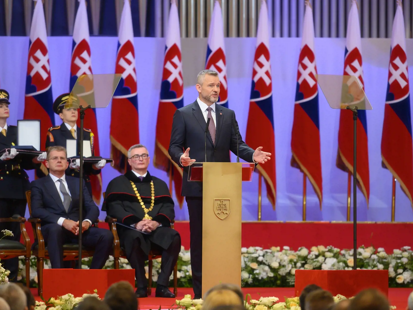 Na snímke uprostred prezident SR Peter Pellegrini počas príhovoru po zložení prezidentského sľubu na slávnostnej schôdzi NR SR v budove Slovenskej filharmónie 15. júna 2024 v Bratislave. Vľavo 
podpredseda Národnej rady SR Peter Žiga (Hlas-SD), ktorý je poverený jej vedením a druhý vľavo predseda Ústavného súdu SR Ivan Fiačan. FOTO TASR - Michal Svítok	