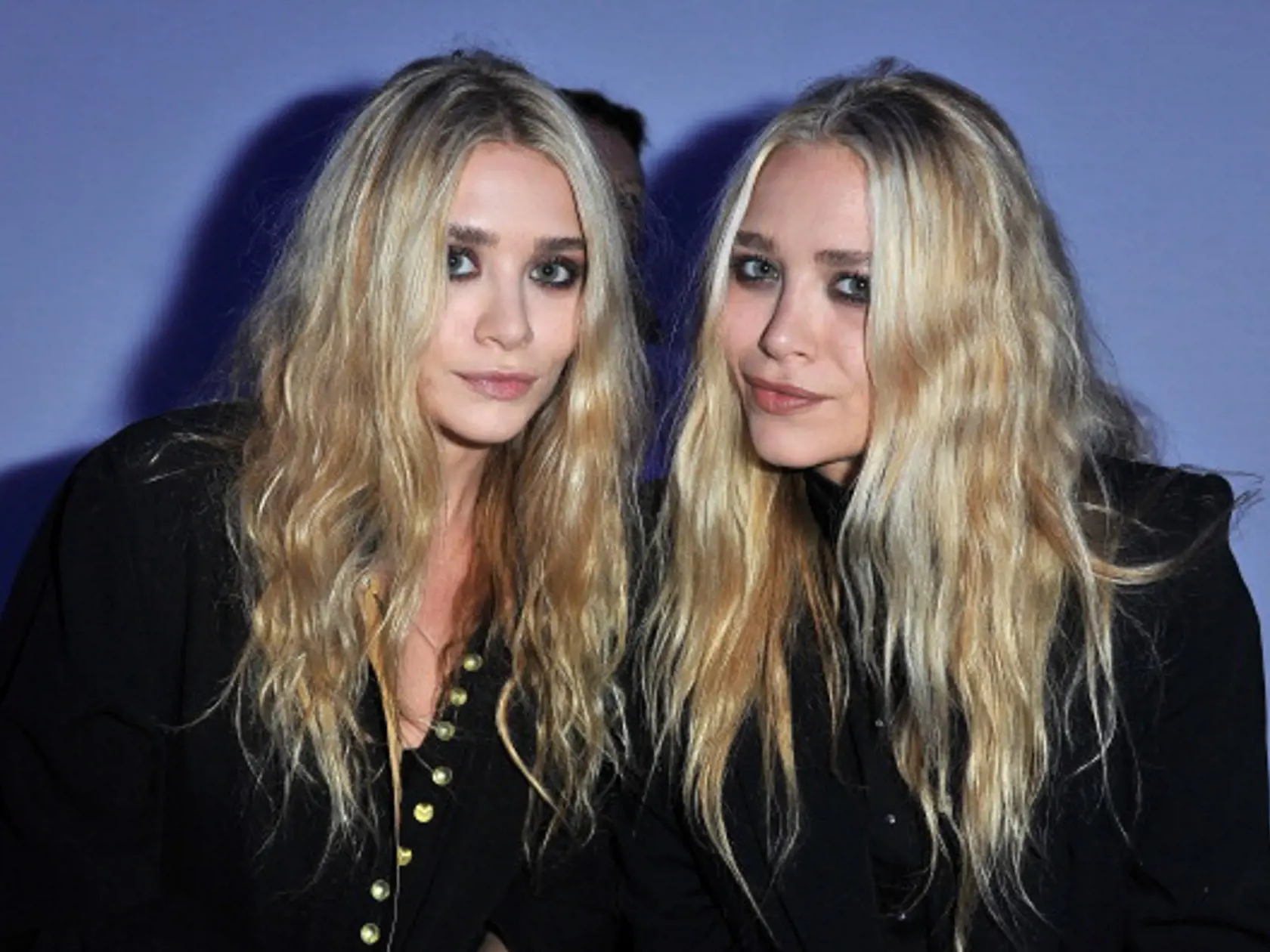 PARIS, FRANCE - OCTOBER 01:  Mary-Kate Olsen and Ashley Olsen attend the Dw by Kanye West Ready to Wear Spring / Summer 2012 show during Paris Fashion Week at Lycee Henri IV on October 1, 2011 in Paris, France.  (Photo by Pascal Le Segretain/Getty Images)