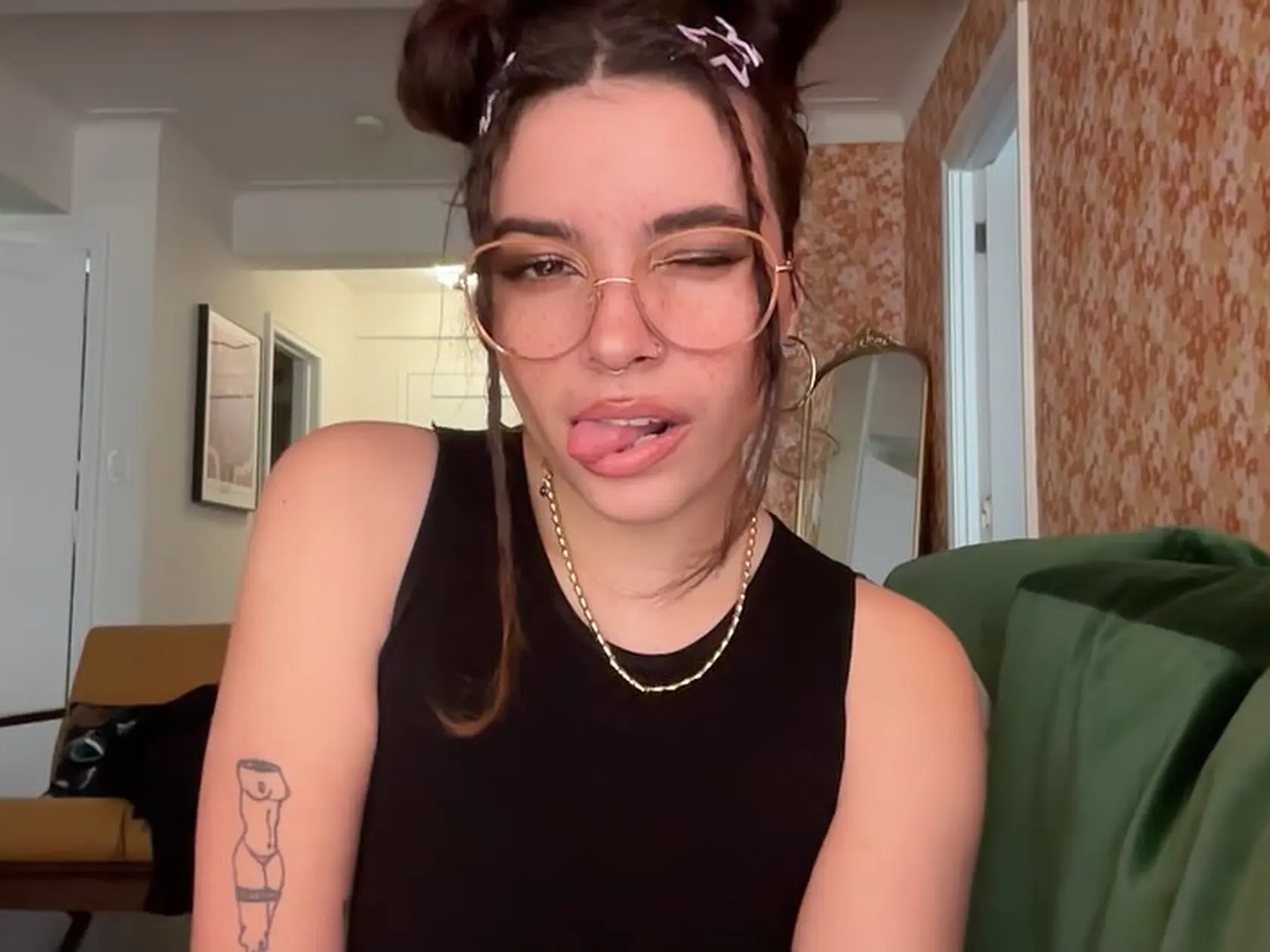 Dcéra speváka Davida Bowieho a modelky Iman. Krásu zdedila po mame, talent po otcovi.