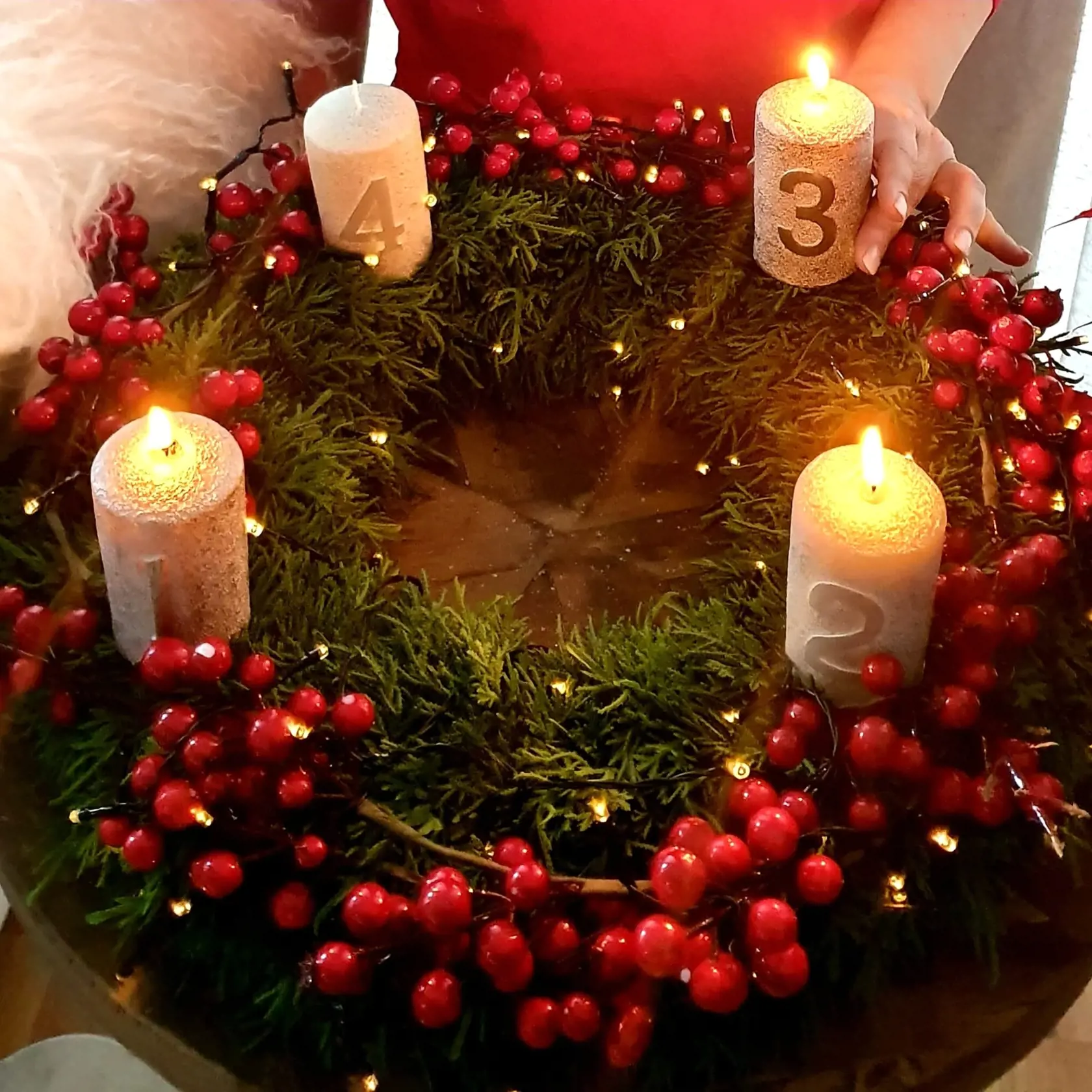 Tretia adventná nedeľa. Symbolika sviec na adventnom venci.