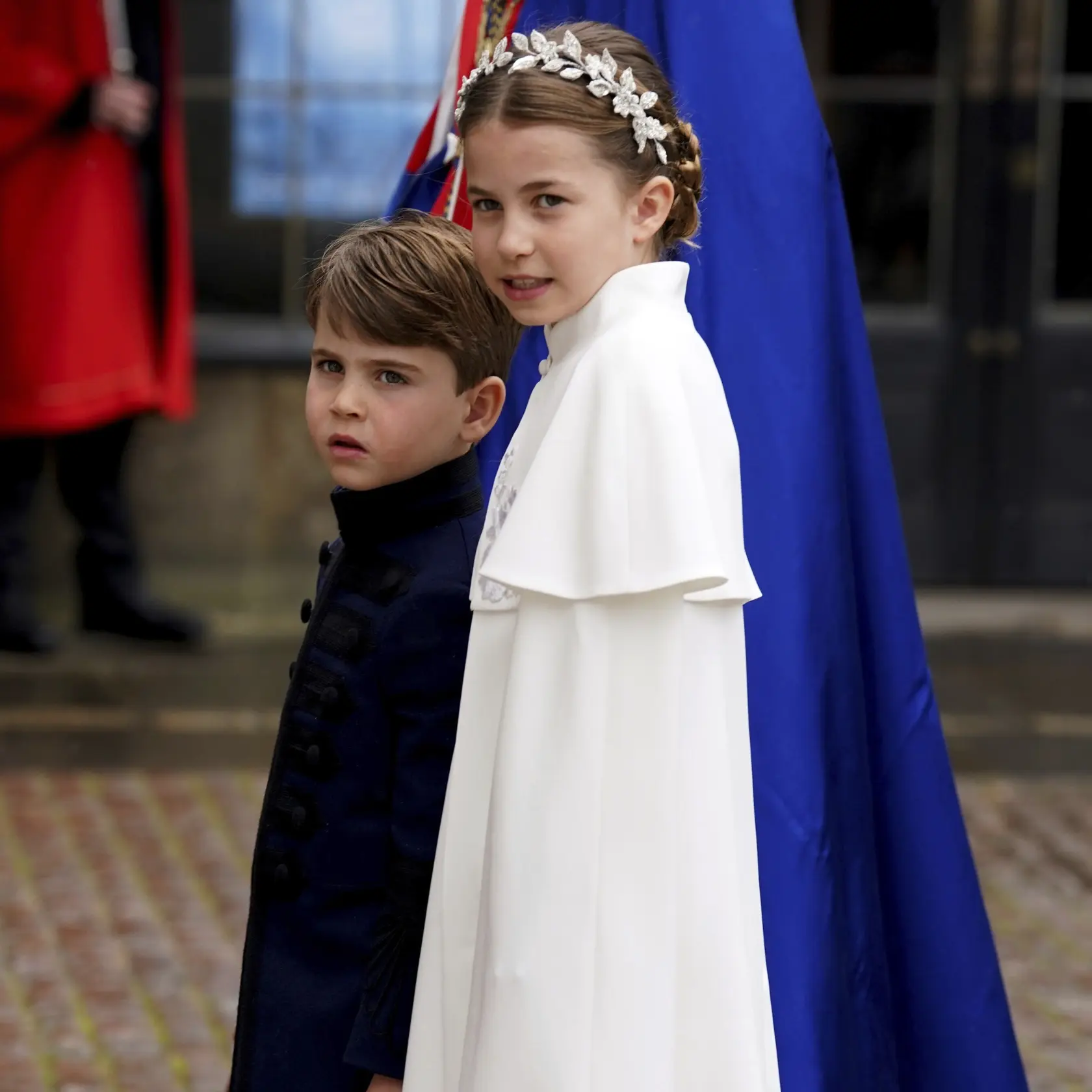 WA 36 Londýn - Britská princezná Charlotte a princ Louis prichádzajú na slávnostnú korunováciu britského kráľa Karola III. a jeho manželky Kamily do Westminsterského opátstva v Londýne v sobotu 6. mája 2023. FOTO TASR/AP

Princess Charlotte and Prince Louis arrive at Westminster Abbey ahead of the coronation of King Charles III and Camilla, the Queen Consort, in London, Saturday, May 6, 2023. (Andrew Milligan/Pool via AP)