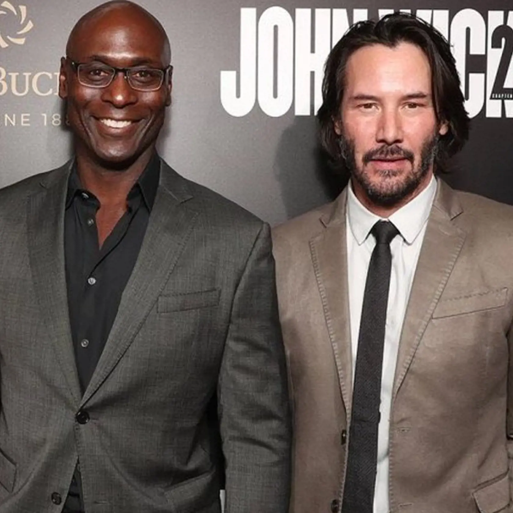 Parťáci Lance Reddick a Keanu Reeves