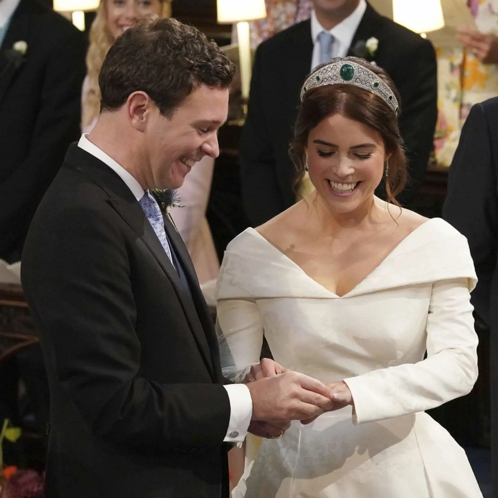 The Rt Revd David Conner, Dean of Windsor conducts the wedding ceremony between Princess Eugenie of York and Jack Brooksbank in St Georgeâs Chapel, Windsor Castle, near London, England, Friday Oct. 12, 2018. (Jonathan Brady, Pool via AP)
