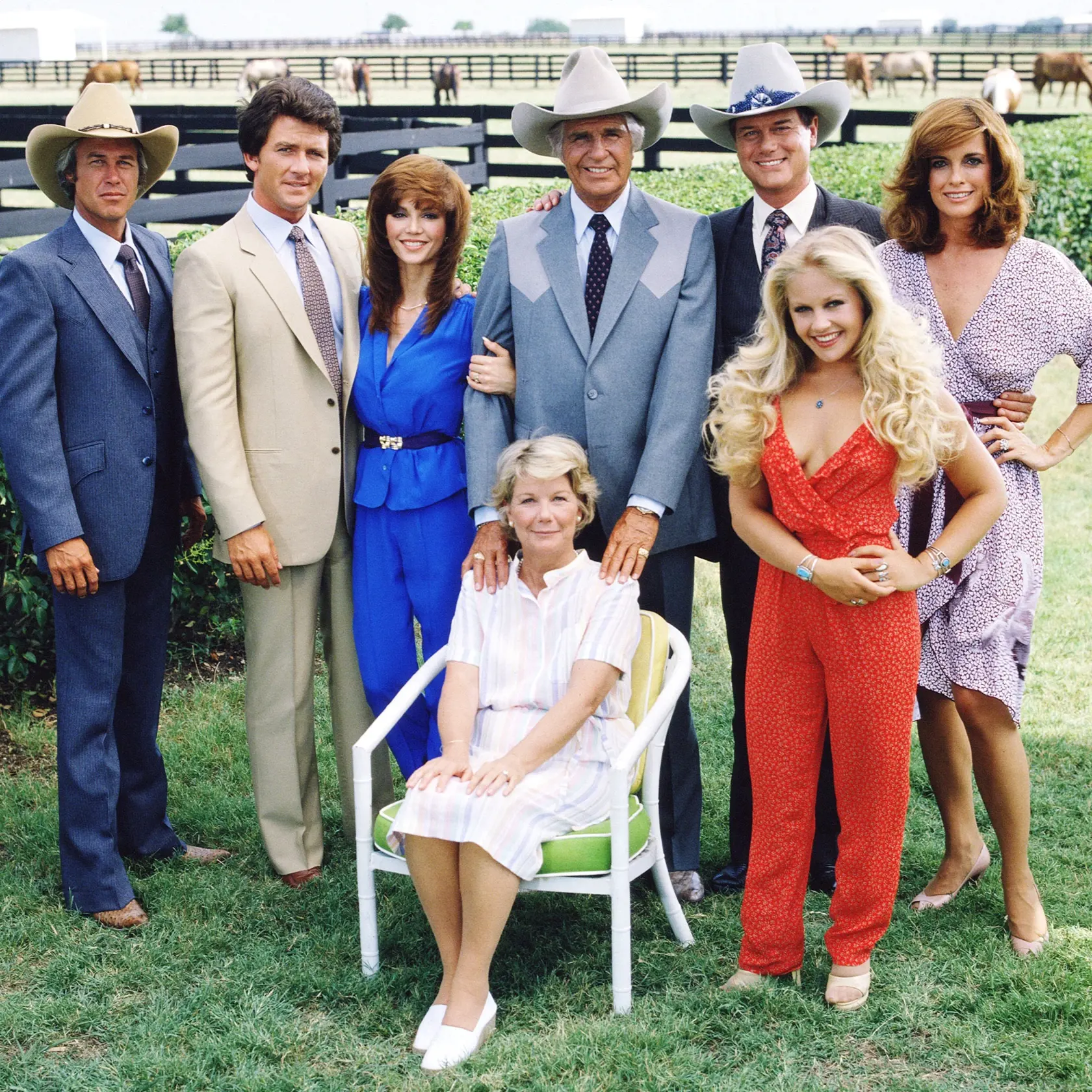 A promotional still from the American television series 'Dallas' shows the cast assembled on the property of the Southfork ranch, on the outskirts of Dallas, Texas, 1979. From left, American actors Steve Kanaly (as Ray Krebbs), Patrick Duffy (as Bobby Ewing), Victoria Principal (as Pamels Barnes Ewing),  (sitting), Barbara Bel Geddes (as Eleanor Southworth 'Miss Ellie' Ewing), Jim Davis (1909 - 1981) (as John Ross 'Jock' Ewing), Larry Hagman (as John Ross 'J.R.' Ewing, Jr.), Charlene Tilton (as 