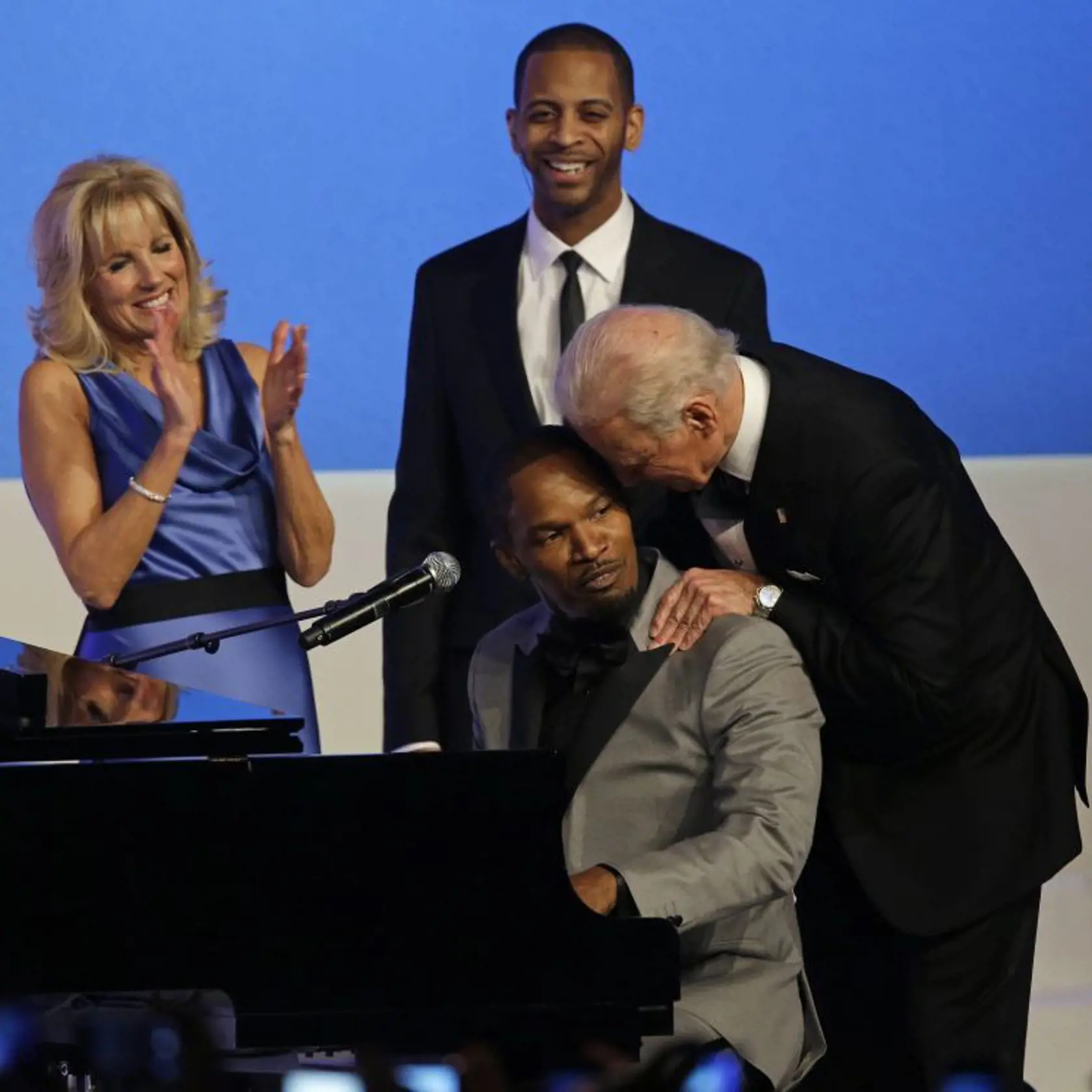 Vice President Joe Biden talks to Jamie Foxx as Jill Biden watches during The Inaugural Ball at the Washington convention center during the 57th Presidential Inauguration in Washington, Monday, Jan. 21, 2013. (AP Photo/Paul Sancya)