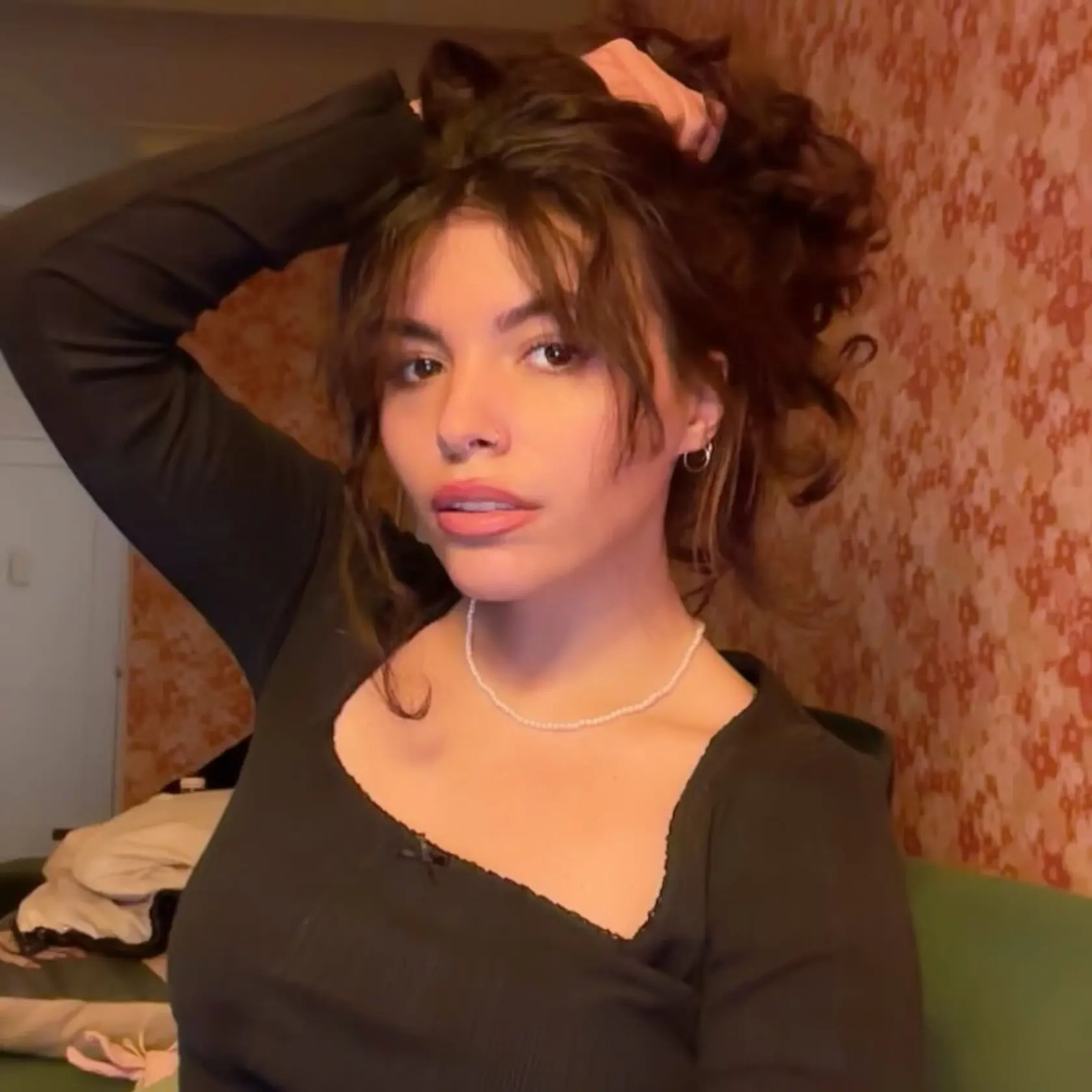 Dcéra speváka Davida Bowieho a modelky Iman. Krásu zdedila po mame, talent po otcovi.