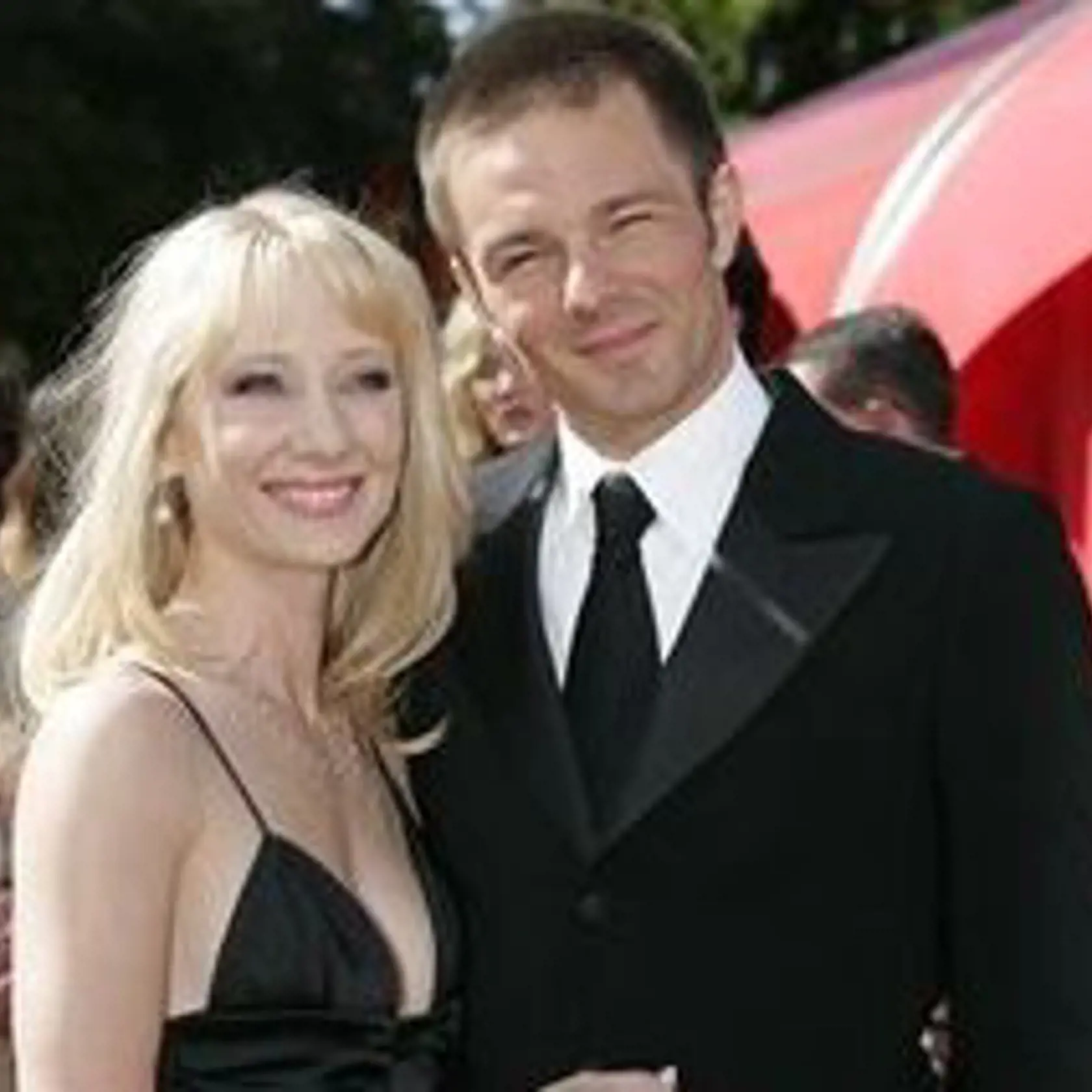 **FILE**Actress Anne Heche, left, is joined by husband Coleman Laffoon as she arrives for the  Emmy Awards   Sept. 19, 2004, at the Shrine Auditorium in Los Angeles. Laffoon, who filed for divorce on Feb.2, 2007,  wants at least $33,000 a month in support and joint custody of the couple's 5-year-old son, saying the actress is a bad mother. (AP Photo/Mark J. Terrill)