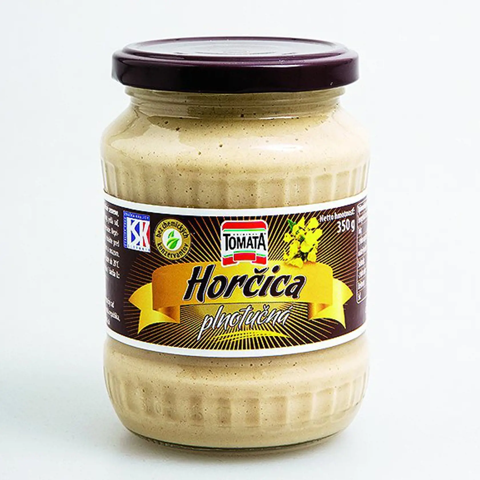 Horčica plnotučná
TOMATA, 350 g
Krajina pôvodu/ Slovensko
Zloženie/ pitná voda, horčičné semeno, kvasný ocot, glukózový sirup, jedlá soľ, koreniny
Energia v 100 g/ 397 kJ Tuky/ 4,7 g Sacharidy/ 6,6 g Bielkoviny/ 4,5 g Soľ/ 1,8 g 
Redakcia hodnotí: Svetložltá horčica má príjemnú korenistú vôňu bez náznaku octovej arómy. Konzistencia je akurát hustá, textúra mierne drsnejšia. Chuť horčice je veľmi dobrá, v porovnaní s ostatnými je slanšia, väčšmi korenistá a pikantnejšia, s mierne trpkastou d