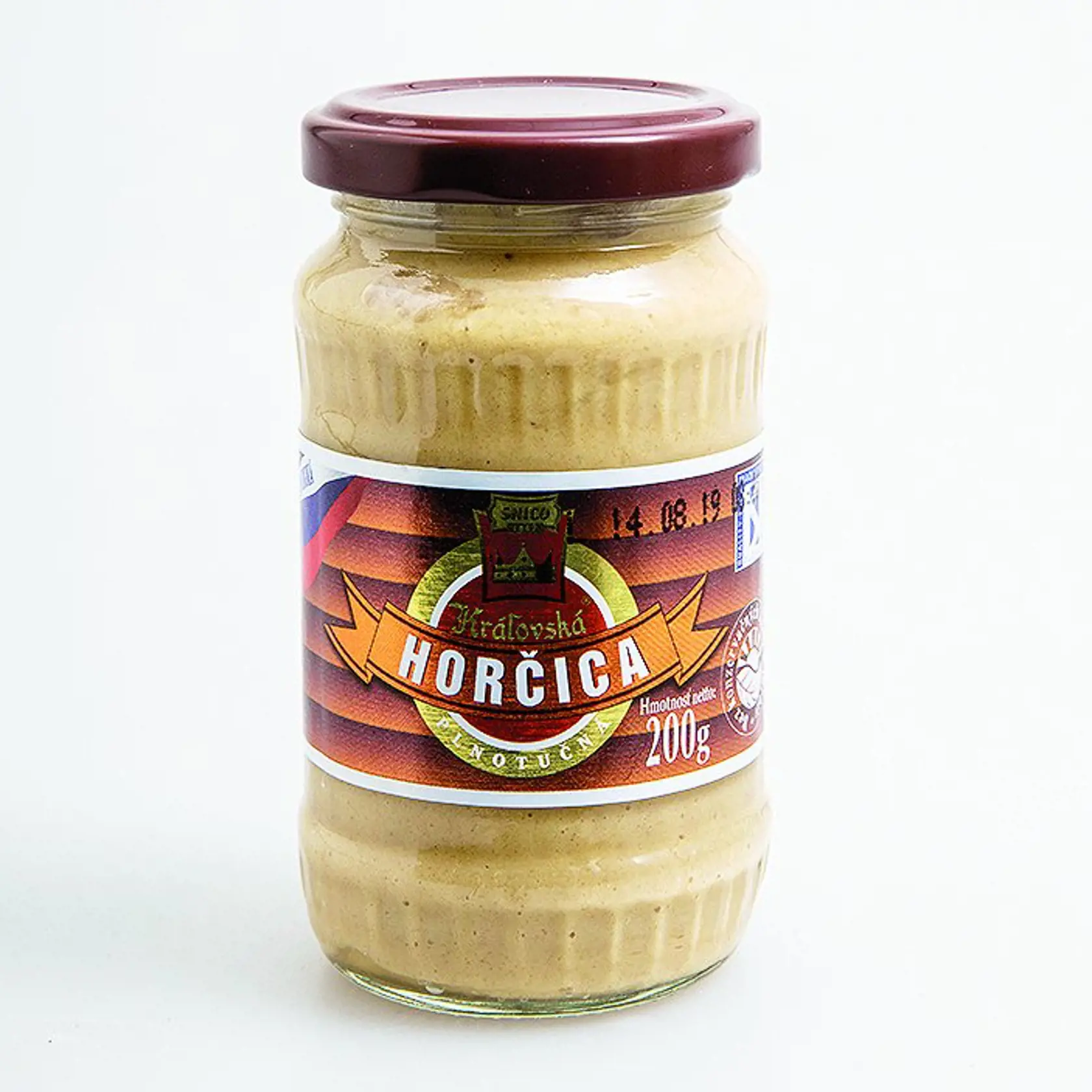 Top! Víťaz - Kráľovská horčica plnotučná
SNICO, 200 g
Krajina pôvodu/ Slovensko
Zloženie/ pitná voda, jemne mleté horčičné semeno, kvasný liehový ocot, cukor, jedlá soľ, koreniny
Energia v 100 g/ 453 kJ Tuky/ 5,9 g Sacharidy/ 7 g Bielkoviny/ 5,1 g Soľ/ 1,4 g 
Redakcia hodnotí: Najtmavšia, okrovožltá horčica s najvýraznejšou horčicovo-korenistou vôňou má správne hustú konzistenciu a hladkú, krémovitú textúru. Z porovnávaných horčíc je chuťovo najvýraznejšia a najlahodnejšia. Najviac v nej cí