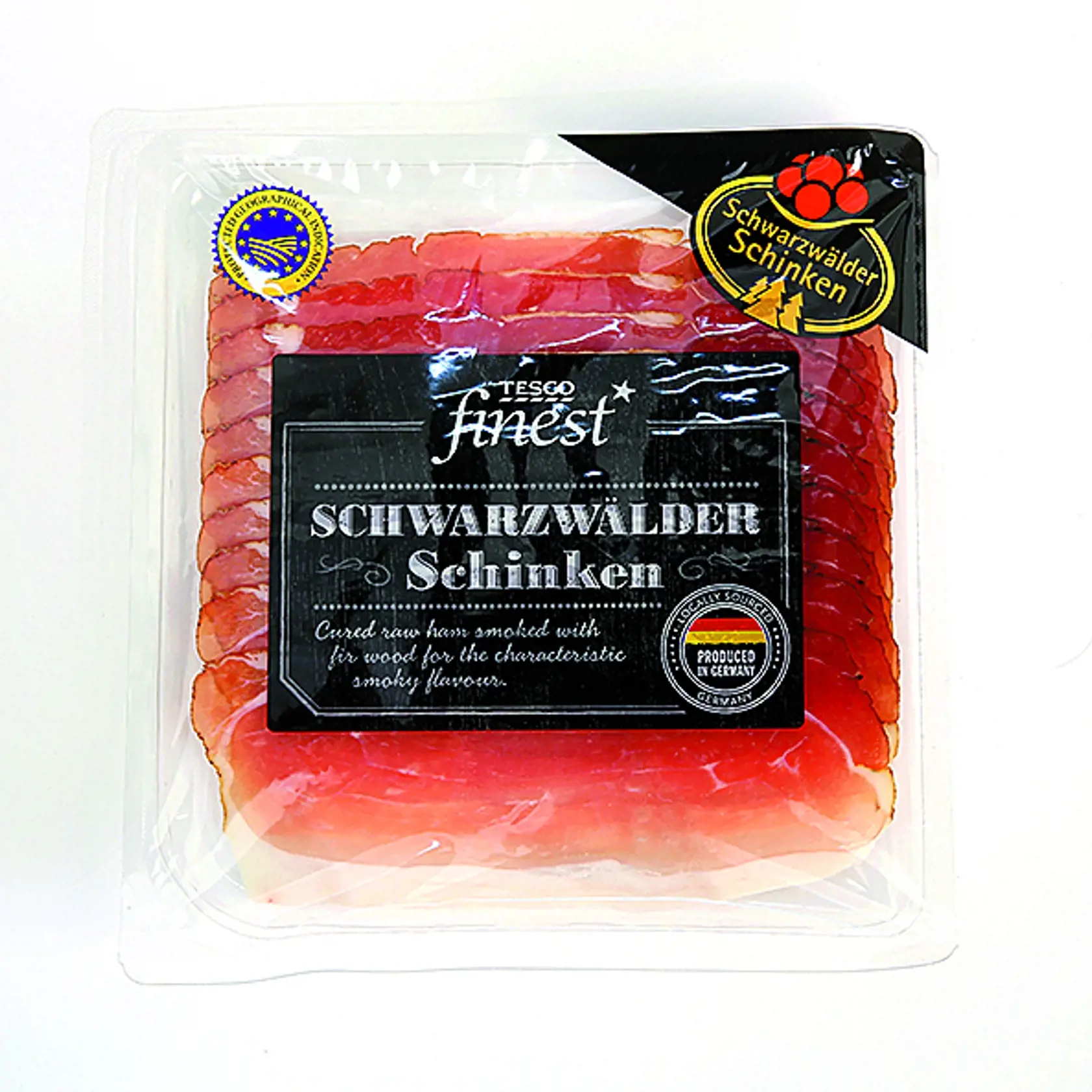 Schwarzwaldská šunka Tesco Finest, 100 g Predáva/ Tesco Krajina pôvodu/ Nemecko Zloženie/ bravčové stehno, jedlá soľ, glukózový sirup, čierne korenie, koriander, konzervačné látky: dusitan sodný a dusičnan draselný, dym z jedľového dreva Energia v 100 g/ 983 kJ Bielkoviny/ 25 g Sacharidy/ 0,2 g Tuky/ 15 g Soľ/ 5,5 g.
REDAKCIA HODNOTÍ: Šunka s najsilnejšou údenou arómou je pokrájaná na tenučké plátky, ktoré sú trocha zlepené a ťaž- šie sa oddeľujú. Na spodnom okraji je tenký pásik tuku, inak je