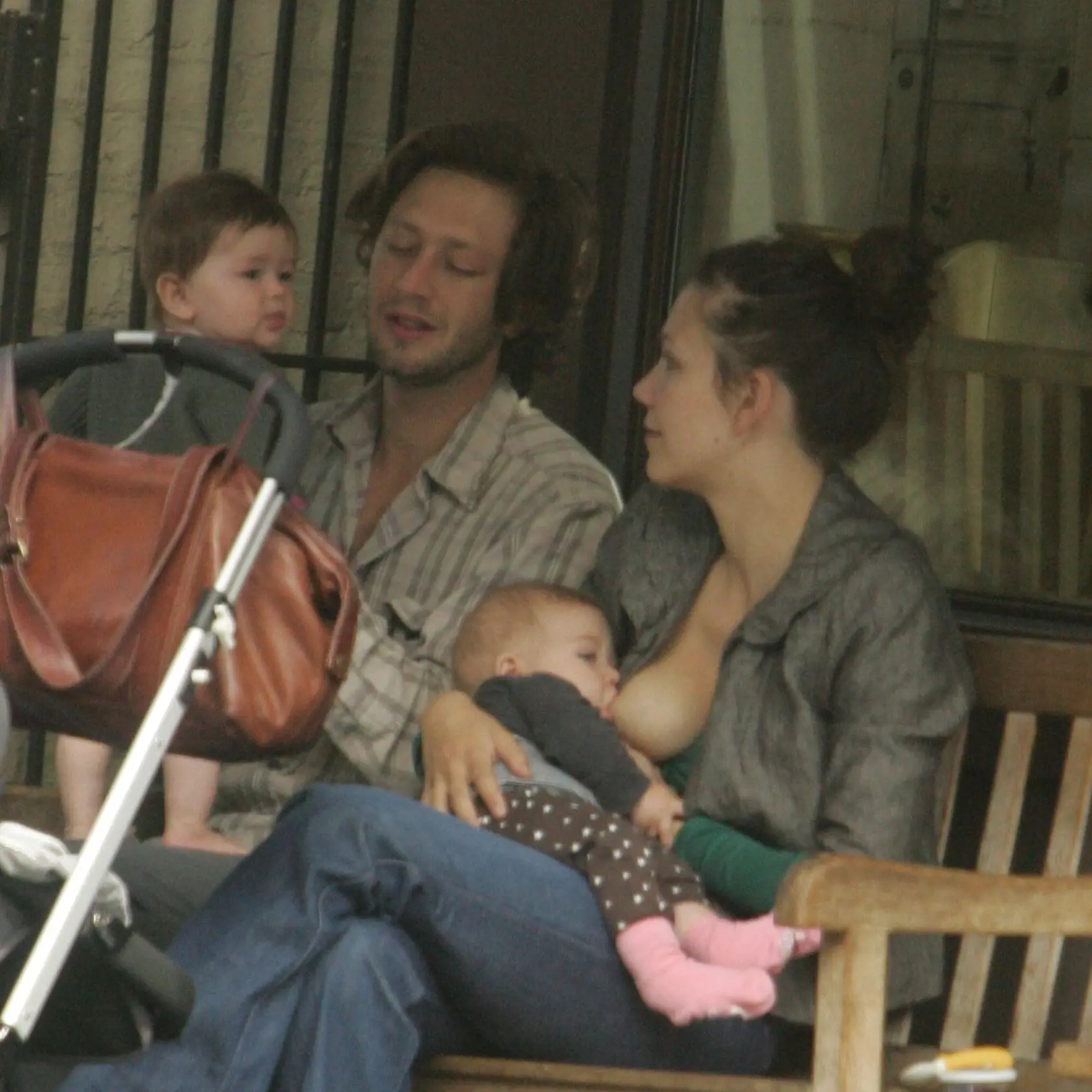 SPECIAL RATES - CALL BEFORE USE - Maggie Gyllenhaal breast feeds daughter Ramona during a stop at Cafe Bonsignour, in the West Village. New York, 06.06.2007. - Germany, Switzerland, Luxemburg and Eastern European rights only -, Image: 21489562, License: Rights-managed, Restrictions: - specified countries only -, Model Release: no, Credit line: Profimedia, Face To Face B