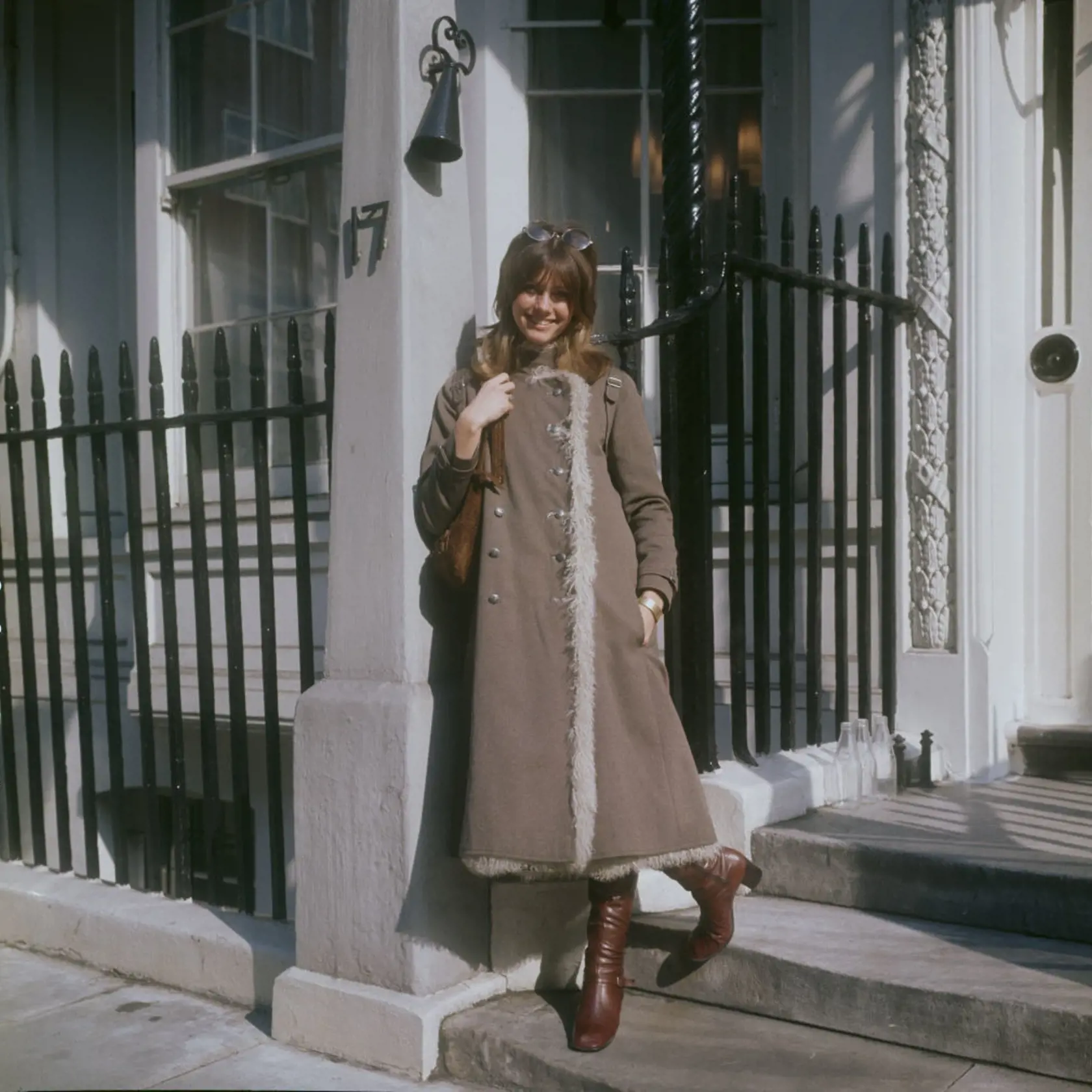 English-Australian singer, Olivia Newton-John, wearing a three-quarter length coat and boots, London, circa 1970.  (Photo by Keystone/Hulton Archive/Getty Images)