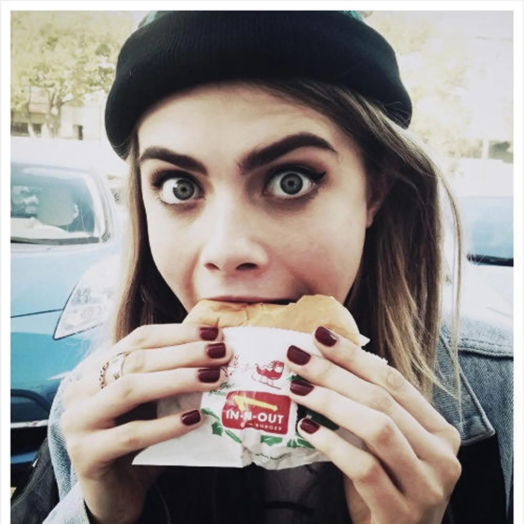 11.12.12 Model Cara Delevingne eating an In-N-Out Burger. Pictured: Cara Delevingne, Image: 148292417, License: Rights-managed, Restrictions: , Model Release: no, Credit line: Profimedia, Planet