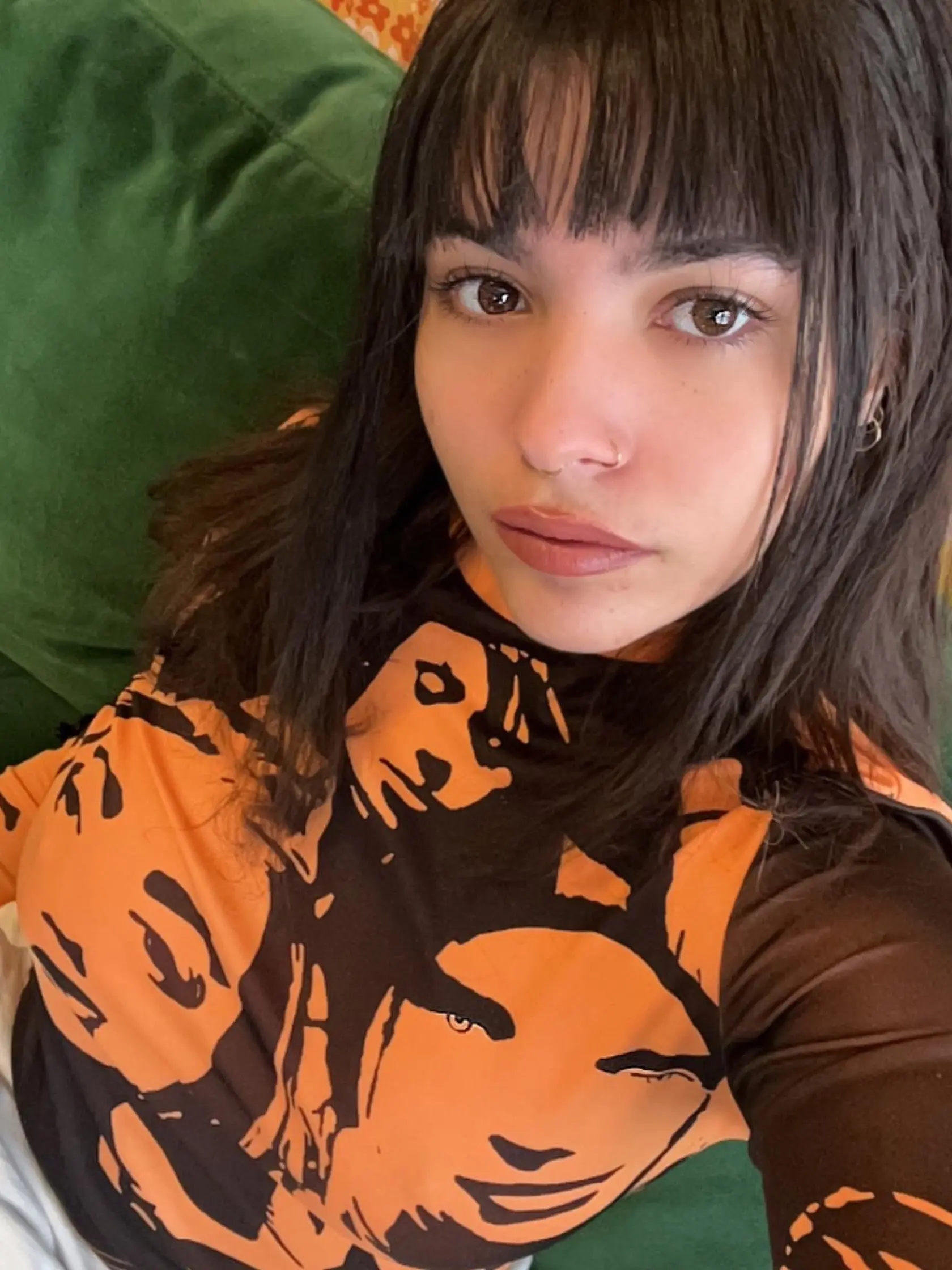 Dcéra speváka Davida Bowieho a modelky Iman. Krásu zdedila po mame, talent po otcovi.