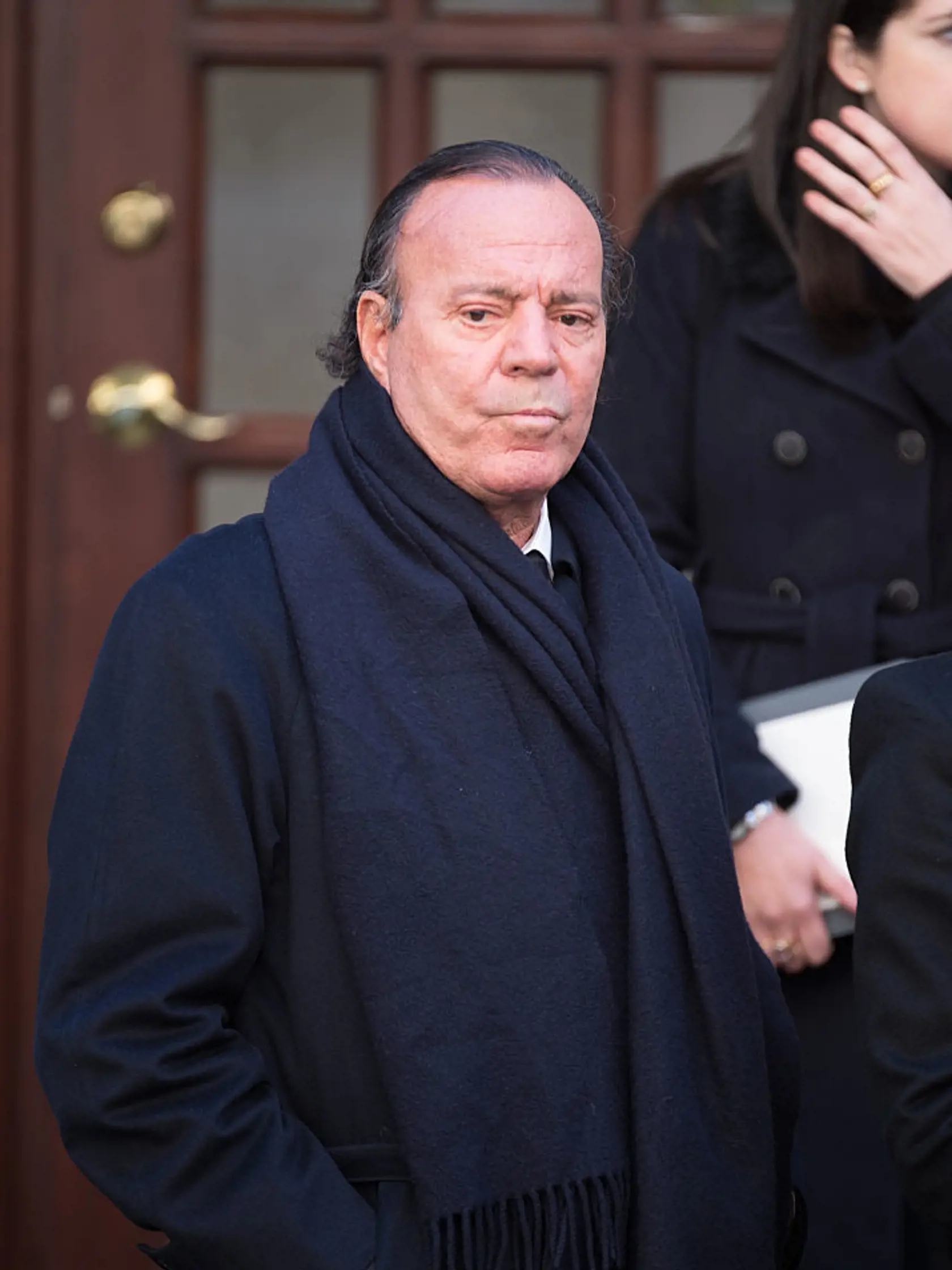 NEW YORK, NY - NOVEMBER 03:  Julio Iglesias departs the funeral of fashion designer Oscar De La Renta at St. Ignatius Of Loyola on November 3, 2014 in New York City.   at St. Ignatius Of Loyola on November 3, 2014 in New York City.  (Photo by Dave Kotinsky/Getty Images)