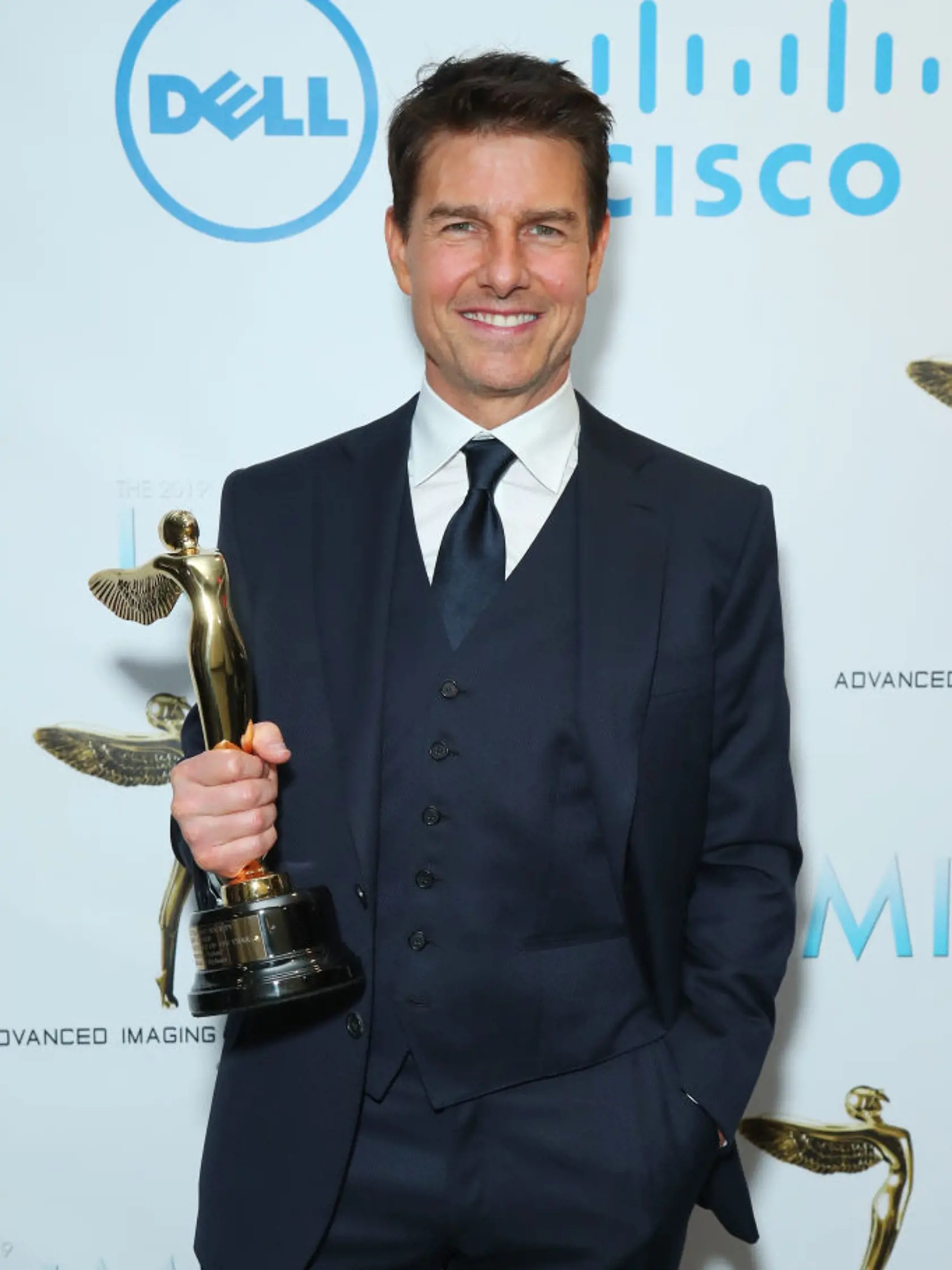 BURBANK, CALIFORNIA - JANUARY 30: Tom Cruise with the Lumiere Award for Best Scene or Sequence for "Mission Impossible: Fallout" attends 10th Annual Lumiere Awards at Warner Bros. Studios on January 30, 2019 in Burbank, California. (Photo by Leon Bennett/Getty Images)