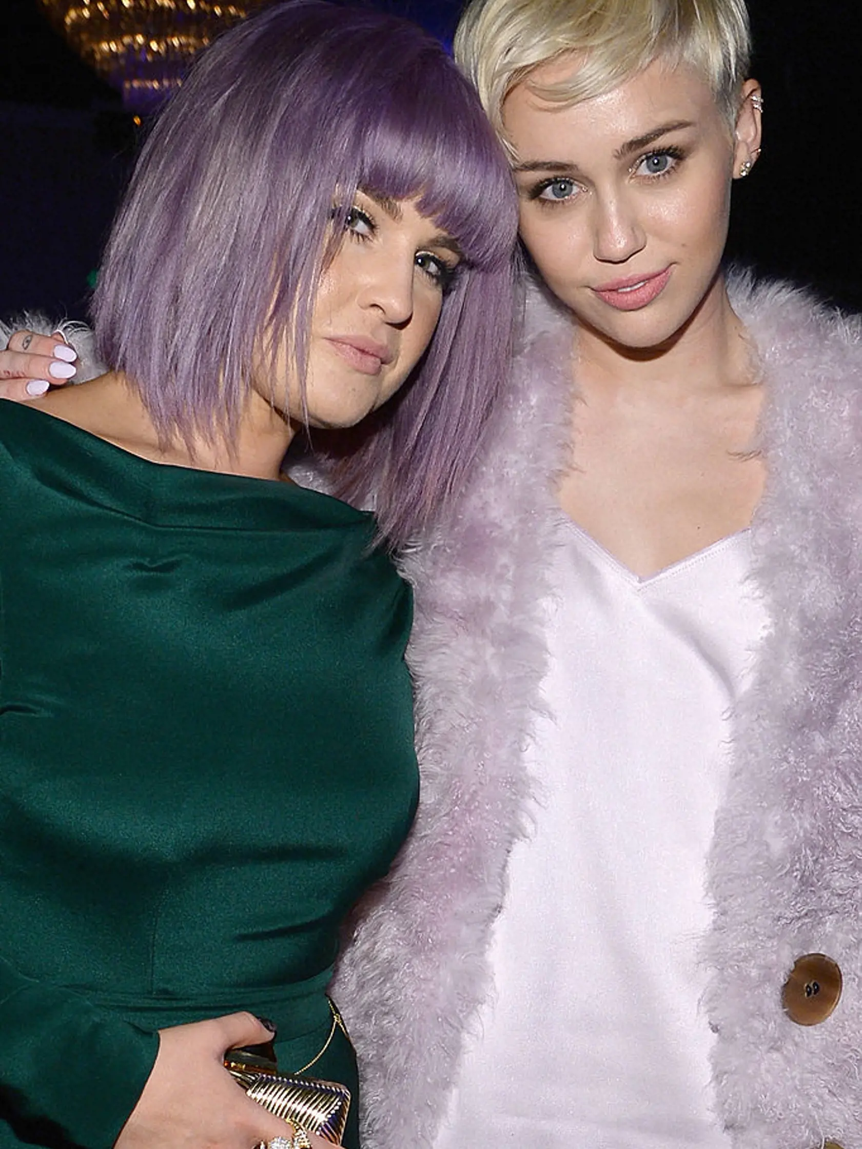 BEVERLY HILLS, CA - JANUARY 25:  TV personality Kelly Osbourne (L) and recording artist Miley Cyrus attend the 56th annual GRAMMY Awards  Pre-GRAMMY Gala and Salute to Industry Icons honoring Lucian Grainge at The Beverly Hilton on January 25, 2014 in Beverly Hills, California.  (Photo by Larry Busacca/Getty Images for NARAS)