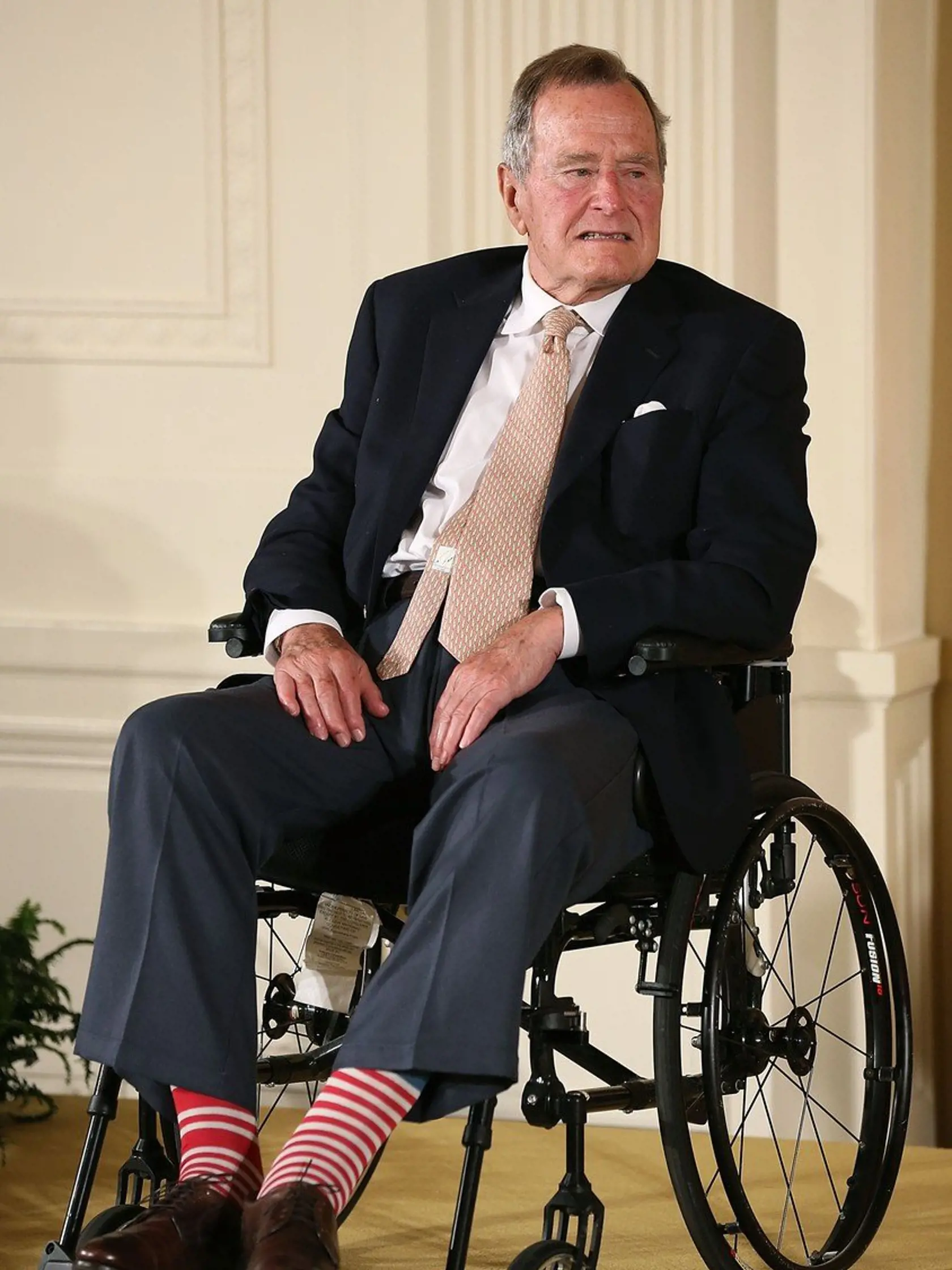(FILES) This file photo taken on July 14, 2013 shows former US President George H. W. Bush as he sits in a wheelchair during an event in the East Room at the White House in Washington, DC.  "Former US President George HW Bush has issued an apology to an actress who accused him of groping her from his wheelchair while attending a screening, according to reports.
Heather Lind, 34, said the incident occurred four years ago at an event to promote the TV series "Turn: Washington's Spies," according to the Daily Mail, which saved a screenshot of a lengthy Instagram post she wrote and later deleted.I t is the latest in an outpouring of sexual harassment allegations against powerful male figures in entertainment, fashion and finance that followed the downfall of movie mogul Harvey Weinstein, who stands accused of assaulting and raping actresses., Image: 353836243, License: Rights-managed, Restrictions: , Model Release: no, Credit line: Profimedia, AFP