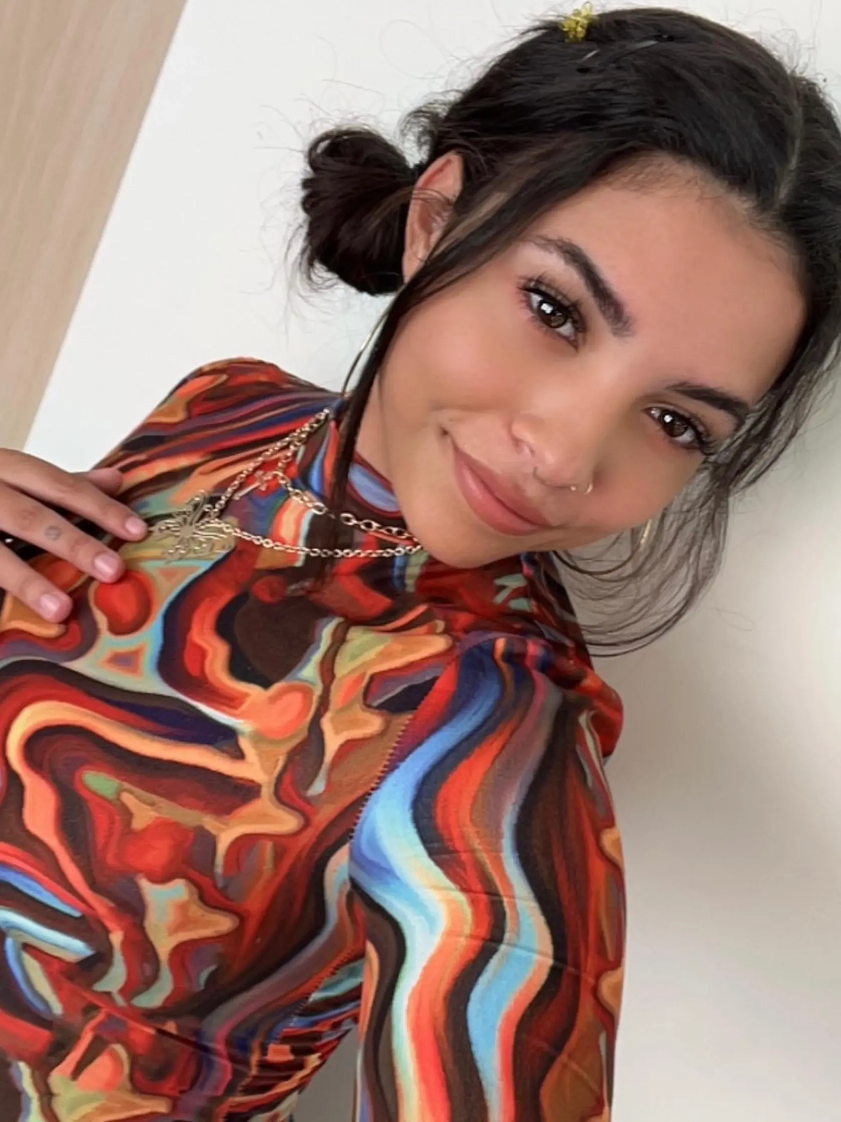 Dcéra speváka Davida Bowieho a modelky Iman. Krásu zdedila po mame, talent po otcovi.