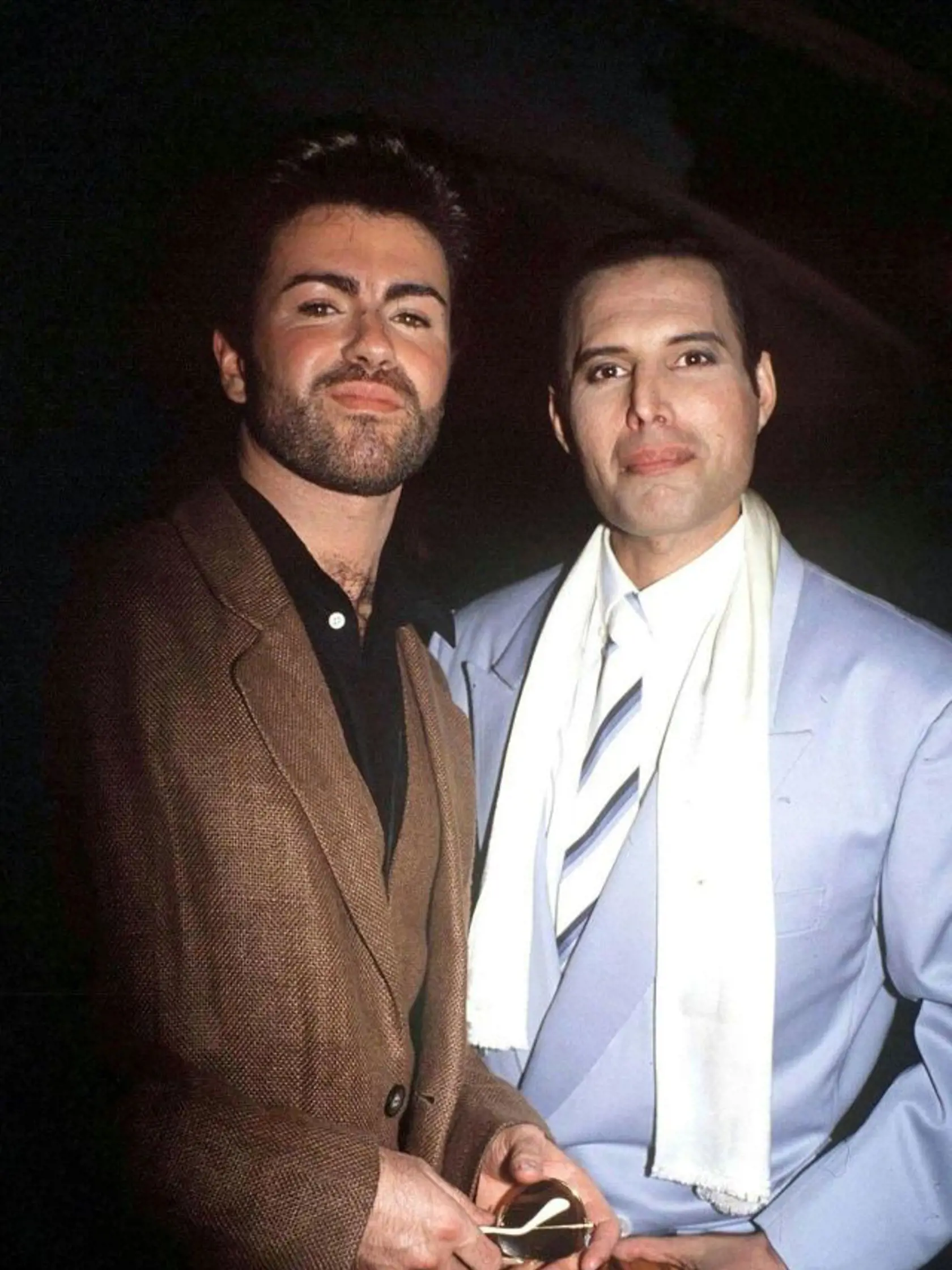 Spevák Queen Freddie Mercury a spevák George Michael.