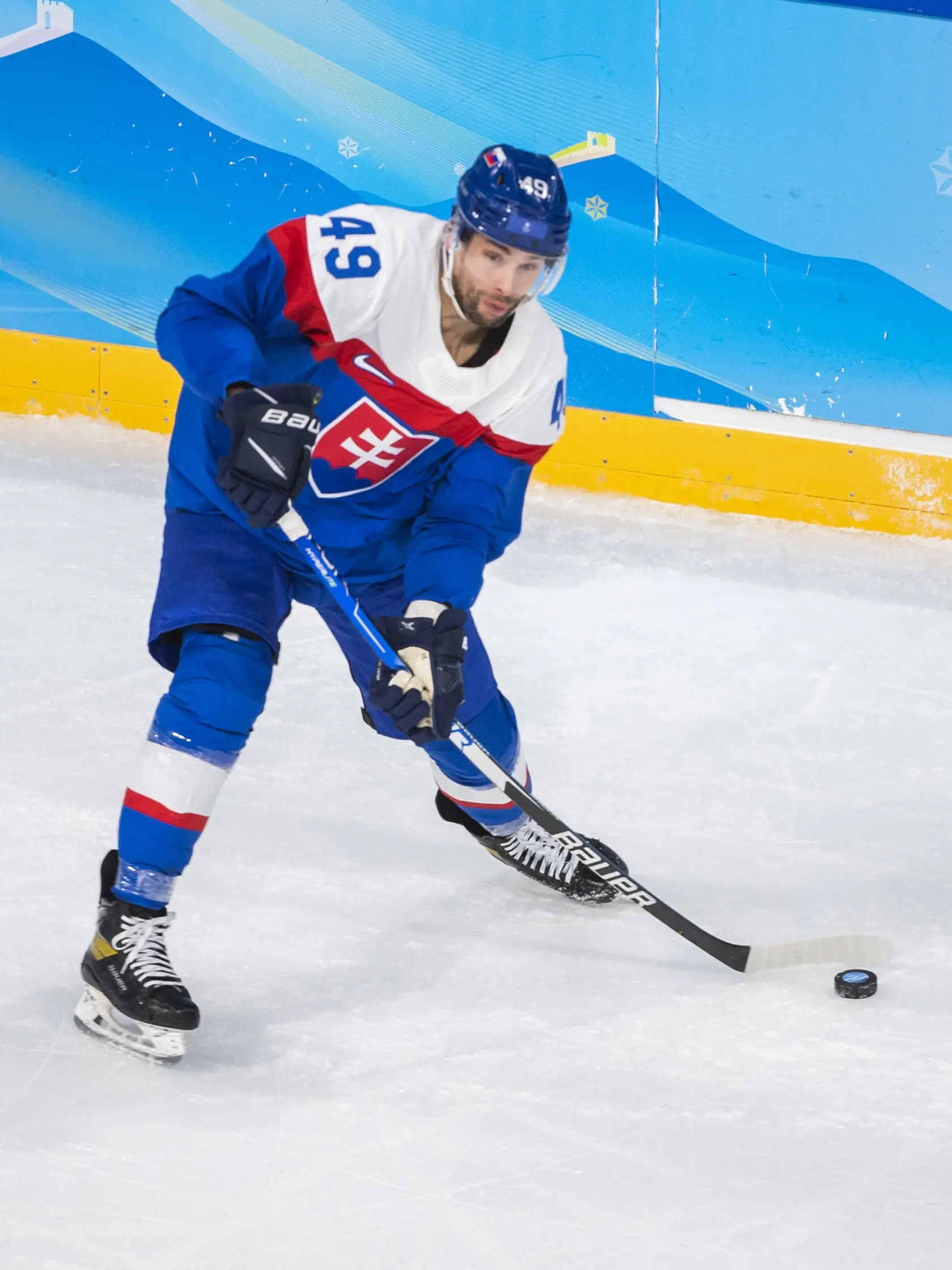 Na snímke hokejista Slovenska Samuel Takáč v zápase základnej C-skupiny Švédsko - Slovensko na ZOH 2022 v hokeji mužov v Pekingu v piatok 11. februára 2022. FOTO TASR - Jaroslav Novák