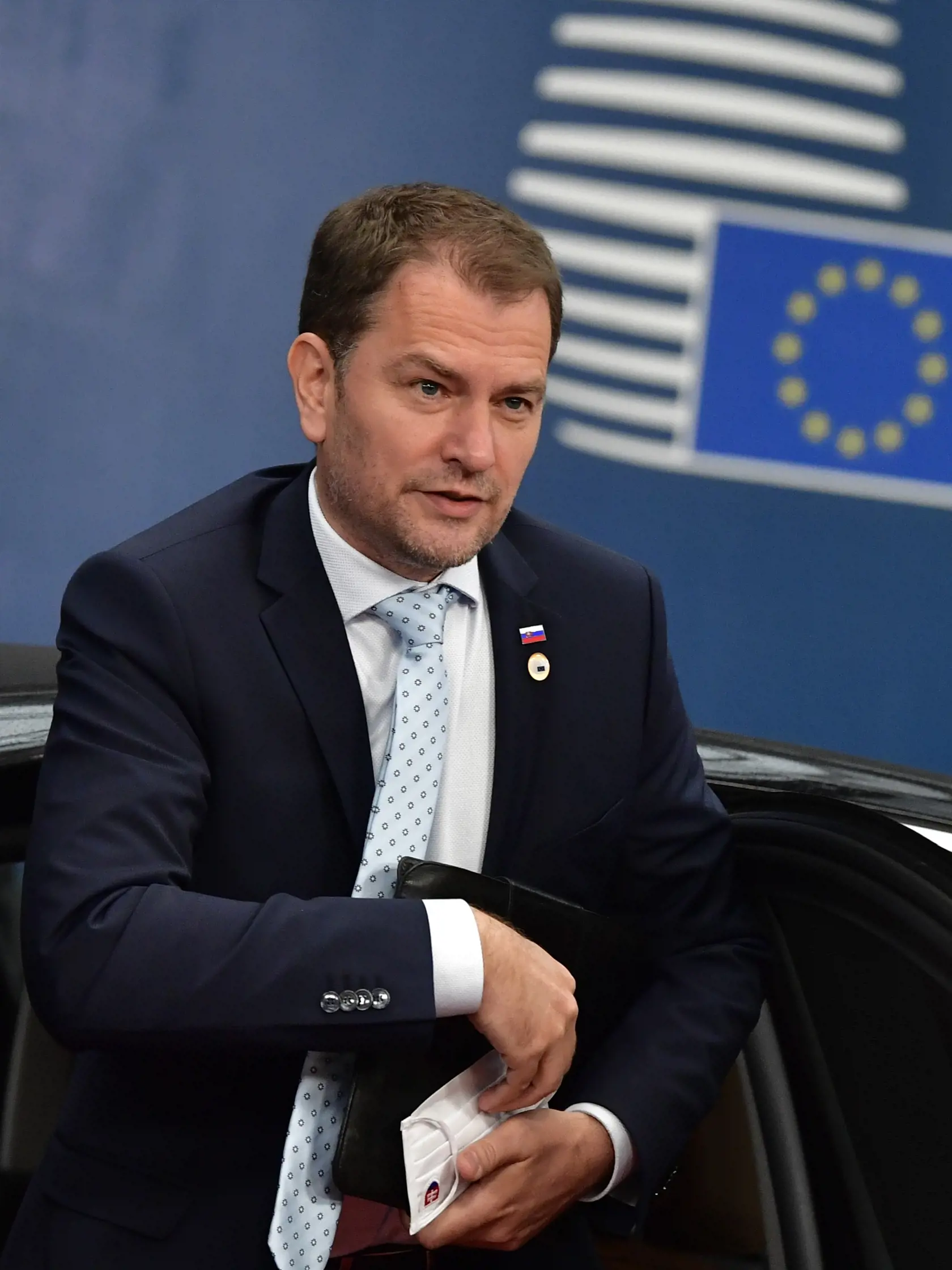 JB 25 Brusel - Slovenský premiér Igor Matovič  prichádza na dvojdňový summit EÚ v sídle Európskej rady v Bruseli 17. júla 2020. Hlavnou témou samitu budú rokovania o pláne obnovy v reakcii na krízu spôsobenú pandémiou ochorenia COVID-19 a o novom dlhodobom rozpočte EÚ. FOTO TASR/AP  

Slovakia's Prime Minister Igor Matovic arrives for an EU summit at the European Council building in Brussels, Friday, July 17, 2020. Leaders from 27 European Union nations meet face-to-face on Friday for the first 
