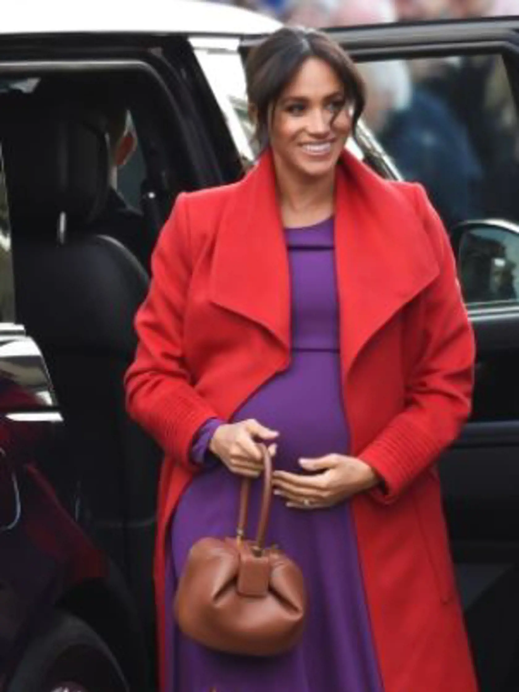 Meghan si obliekla rovnakú kombináciu farieb.