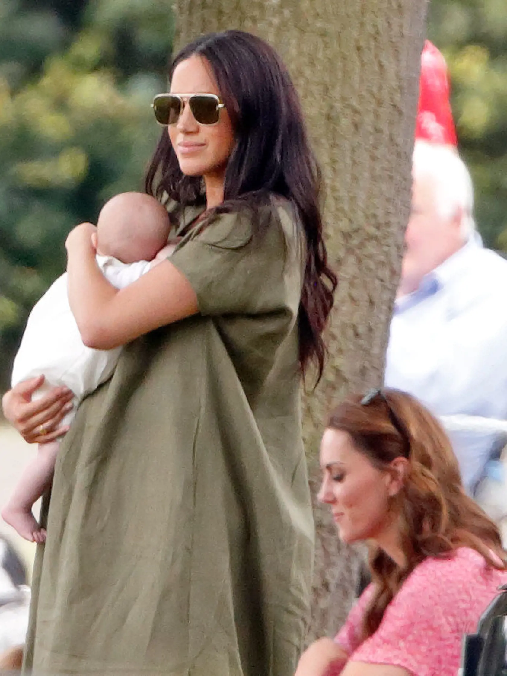 WOKINGHAM, UNITED KINGDOM - JULY 10: (EMBARGOED FOR PUBLICATION IN UK NEWSPAPERS UNTIL 24 HOURS AFTER CREATE DATE AND TIME) Meghan, Duchess of Sussex, Archie Harrison Mountbatten-Windsor and Catherine, Duchess of Cambridge attend the King Power Royal Charity Polo Match, in which Prince William, Duke of Cambridge and Prince Harry, Duke of Sussex were competing for the Khun Vichai Srivaddhanaprabha Memorial Polo Trophy at Billingbear Polo Club on July 10, 2019 in Wokingham, England. (Photo by Max 