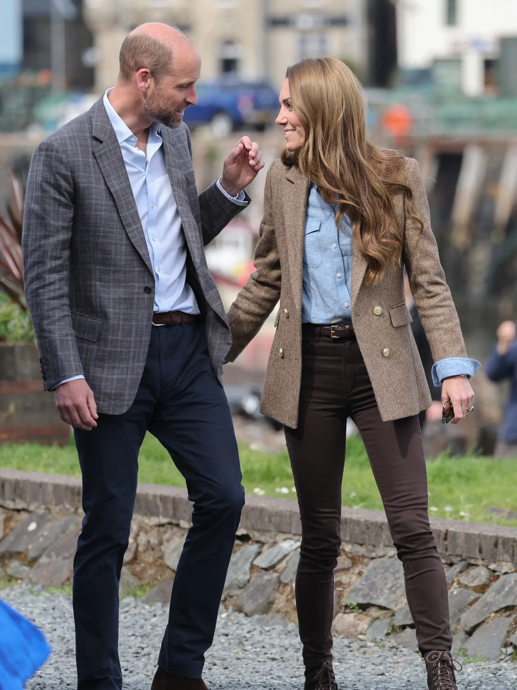 TOBERMORY, SCOTLAND - APRIL 29: Prince William, Prince of Wales, known as the Duke of Rothesay and Catherine, Princess of Wales, known as the Duchess of Rothesay when in Scotland smile at each other during a visit to Aros Hall, a local community hub on April 29, 2025 in Tobermory, Scotland. The Prince and Princess of Wales are on a two-day visit to the Isles of Mull and Iona on the 29th and 30th of April to engage with rural island communities. During their time on the islands, they will connect with local residents, highlighting the value of social bonds and underscoring the importance of safeguarding and advocating for the natural environment. (Photo by Chris Jackson/Getty Images)