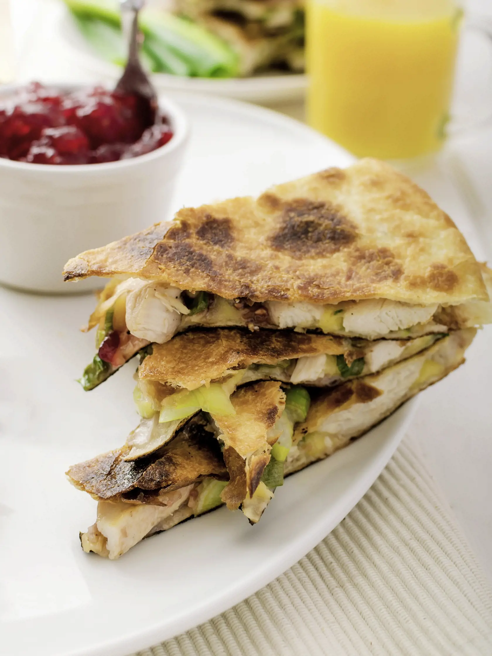 Turkey quesadillas with currant sauce, fresh orange juice