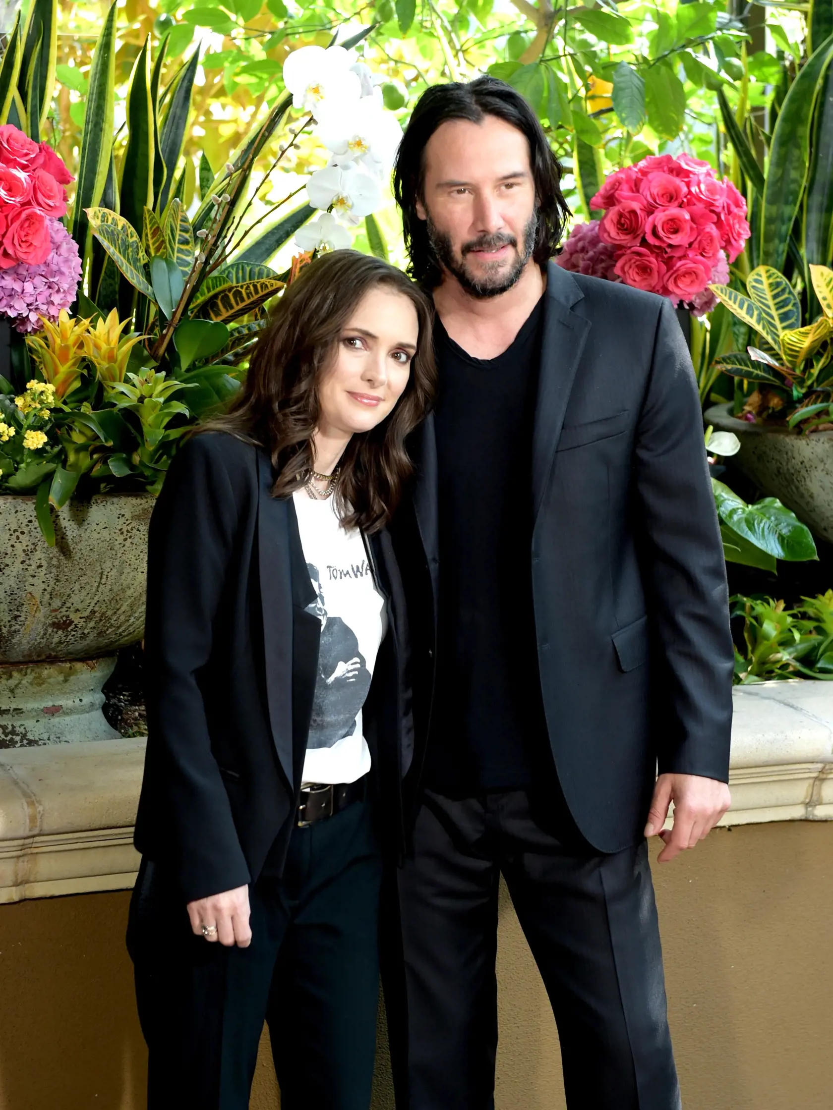 LOS ANGELES, CA - AUGUST 18:  Winona Ryder (L) and Keanu Reeves attend a photo call for Regatta's "Destination Wedding" at the Four Seasons Hotel Los Angeles at Beverly Hills on August 18, 2018 in Los Angeles, California.  (Photo by Kevin Winter/Getty Images)