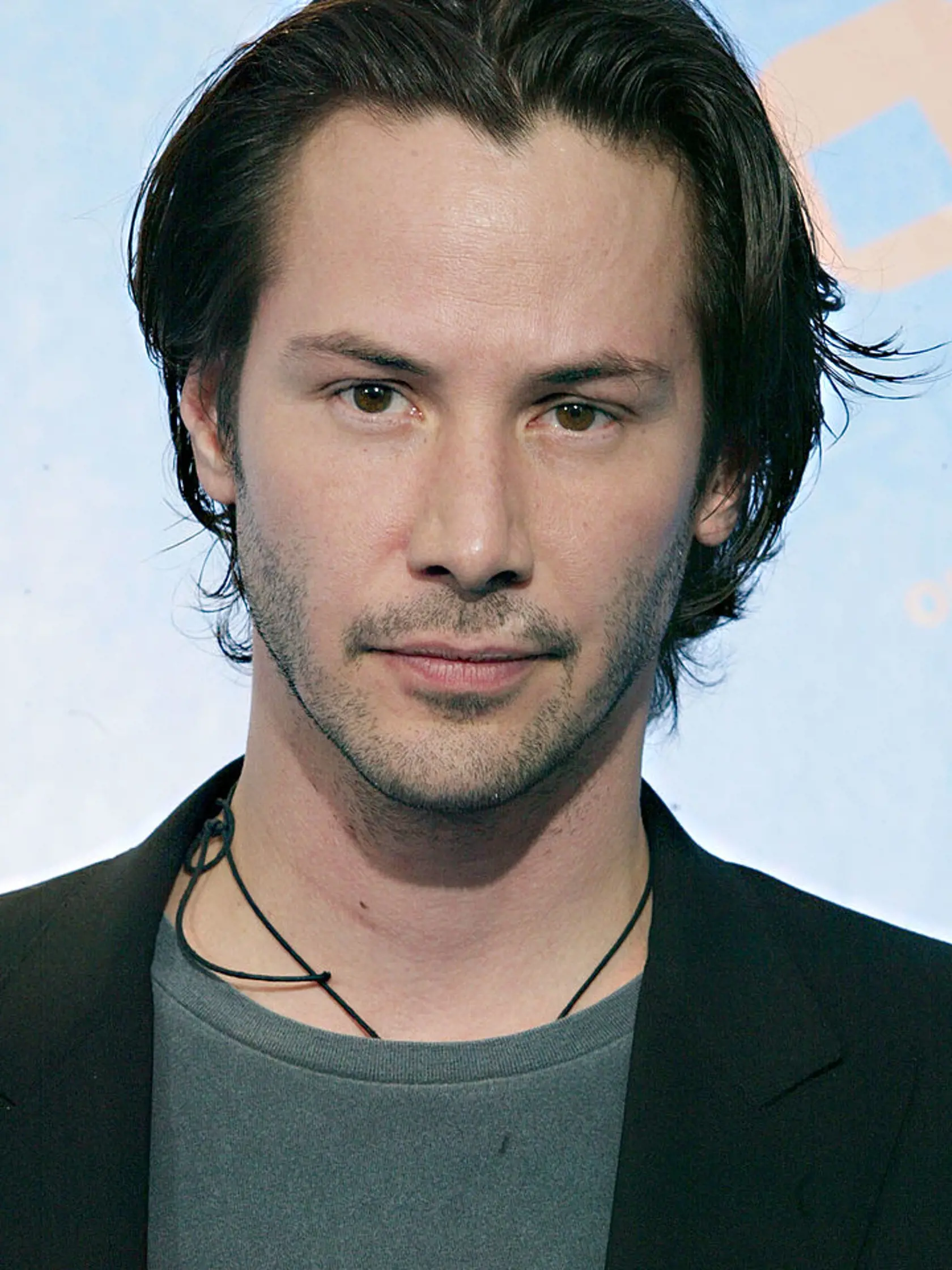 UNIVERSAL CITY, CA - AUGUST 2:  Actor Keanu Reeves poses backstage at The 2003 Teen Choice Awards held at Universal Amphitheater on August 2, 2003 in Universal City, California.  (Photo by Frederick M. Brown/Getty Images)