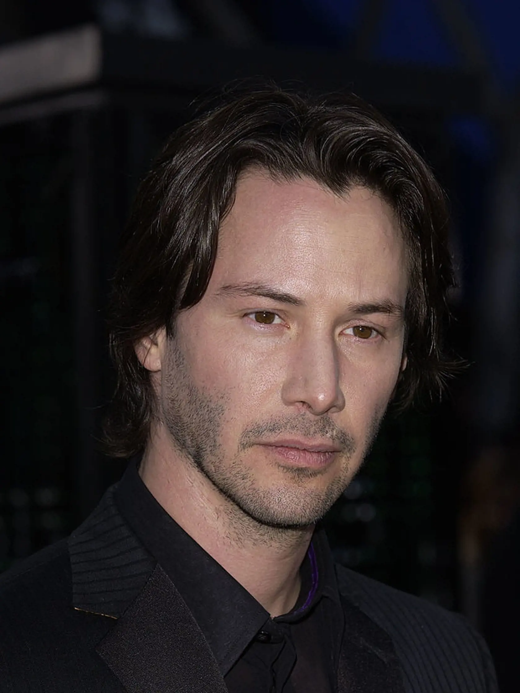 WESTWOOD, CA - MAY 7:  Actor Keanu Reeves attends the premiere of "The Matrix Reloaded" at Mann Village & Bruin Theatre on May 7, 2003 in Westwood, California.  The film opens in theaters nationwide on May 15, 2003.  (Photo by Robert Mora/Getty Images)