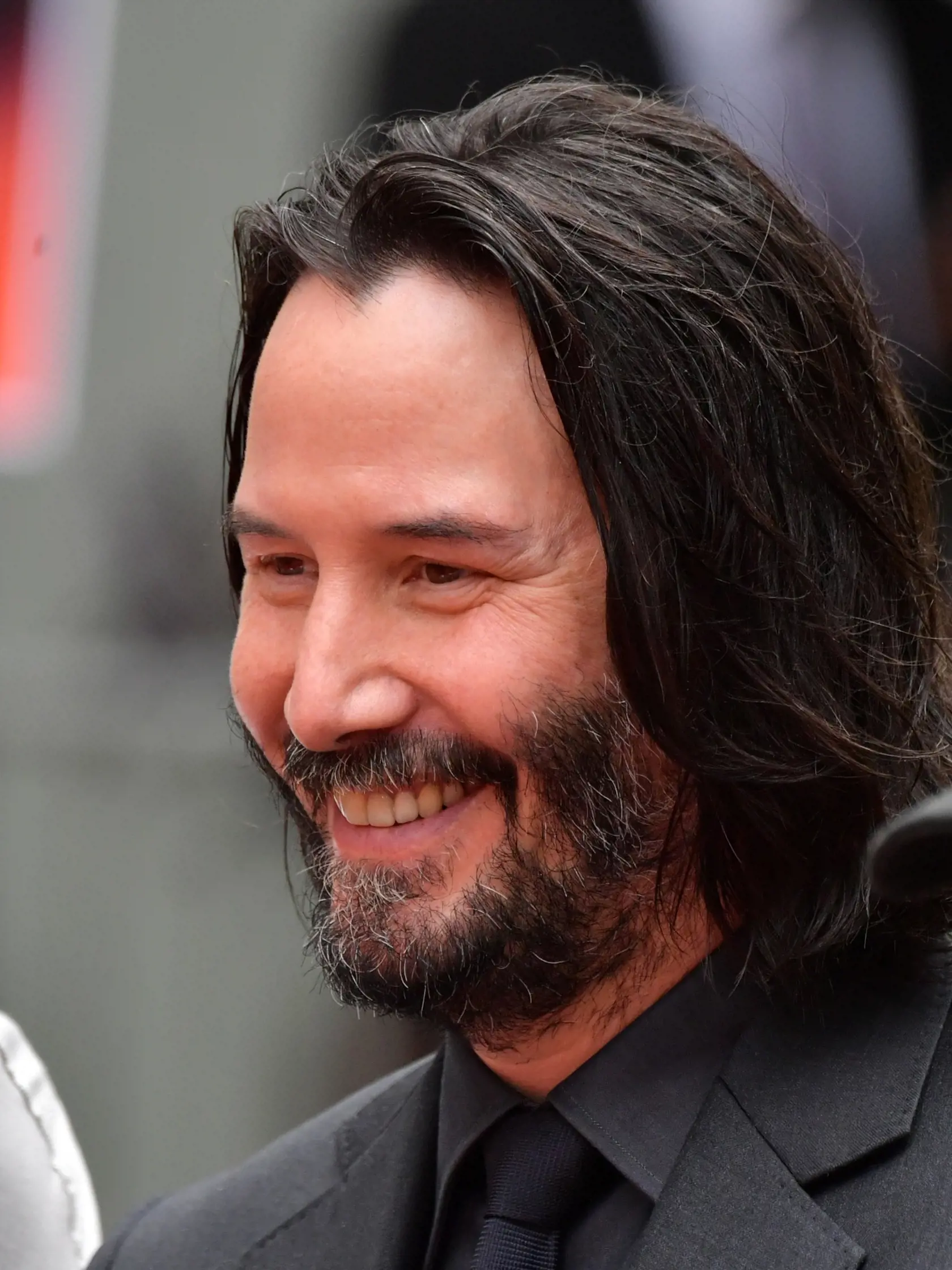 HOLLYWOOD, CALIFORNIA - MAY 14: Keanu Reeves speaks during his handprint ceremony at the TCL Chinese Theatre IMAX forecourt on May 14, 2019 in Hollywood, California. (Photo by Emma McIntyre/Getty Images)