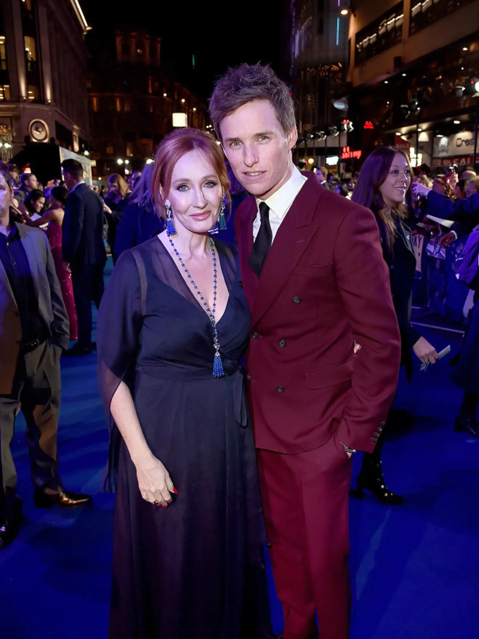 LONDON, ENGLAND - NOVEMBER 13:     J. K. Rowling and Eddie Redmayne attend the UK Premiere of Fantastic Beasts: The Crimes of Grindelwald in London's Leicester Square on November 13, 2018 in London, United Kingdo  (Photo by Eamonn M. McCormack/Eamonn M. McCormack/Getty Images for Warner Bros)