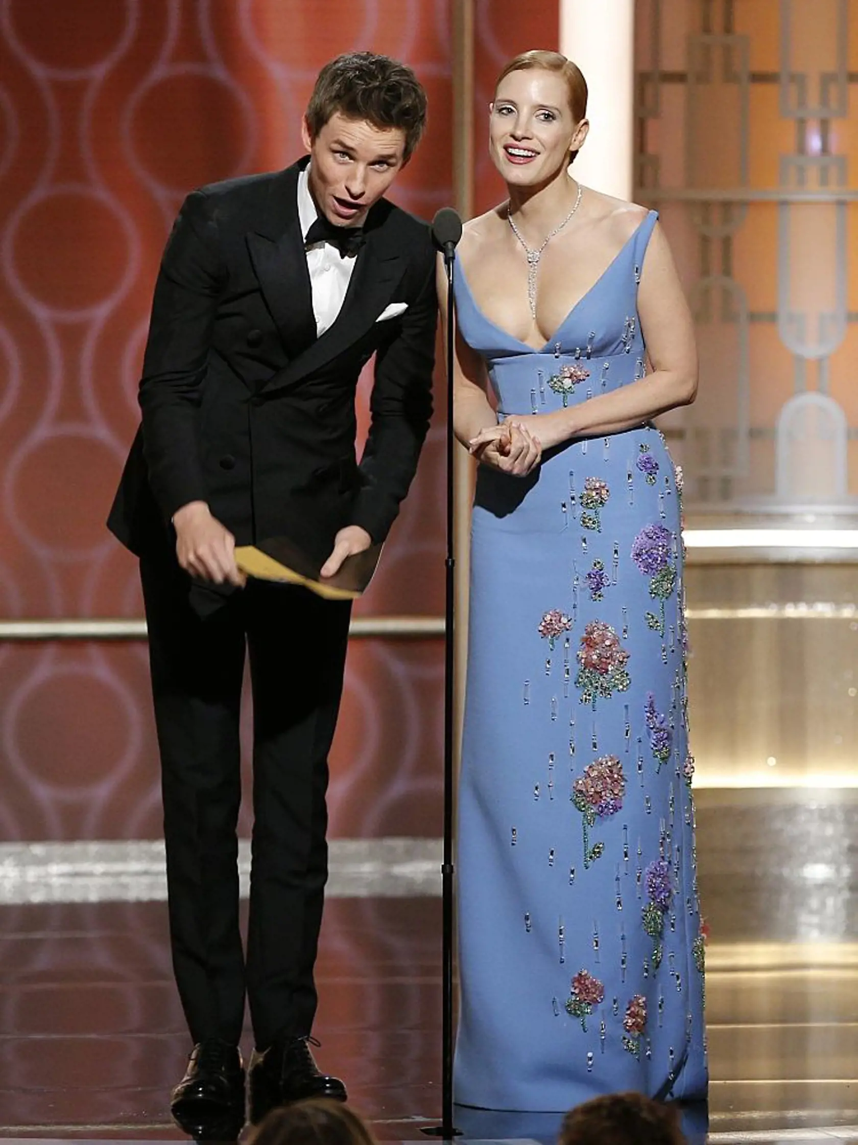 BEVERLY HILLS, CA - JANUARY 08: In this handout photo provided by NBCUniversal, presenters Eddie Redmayne (L) and Jessica Chastain onstage during the 74th Annual Golden Globe Awards at The Beverly Hilton Hotel on January 8, 2017 in Beverly Hills, California. (Photo by Paul Drinkwater/NBCUniversal via Getty Images)