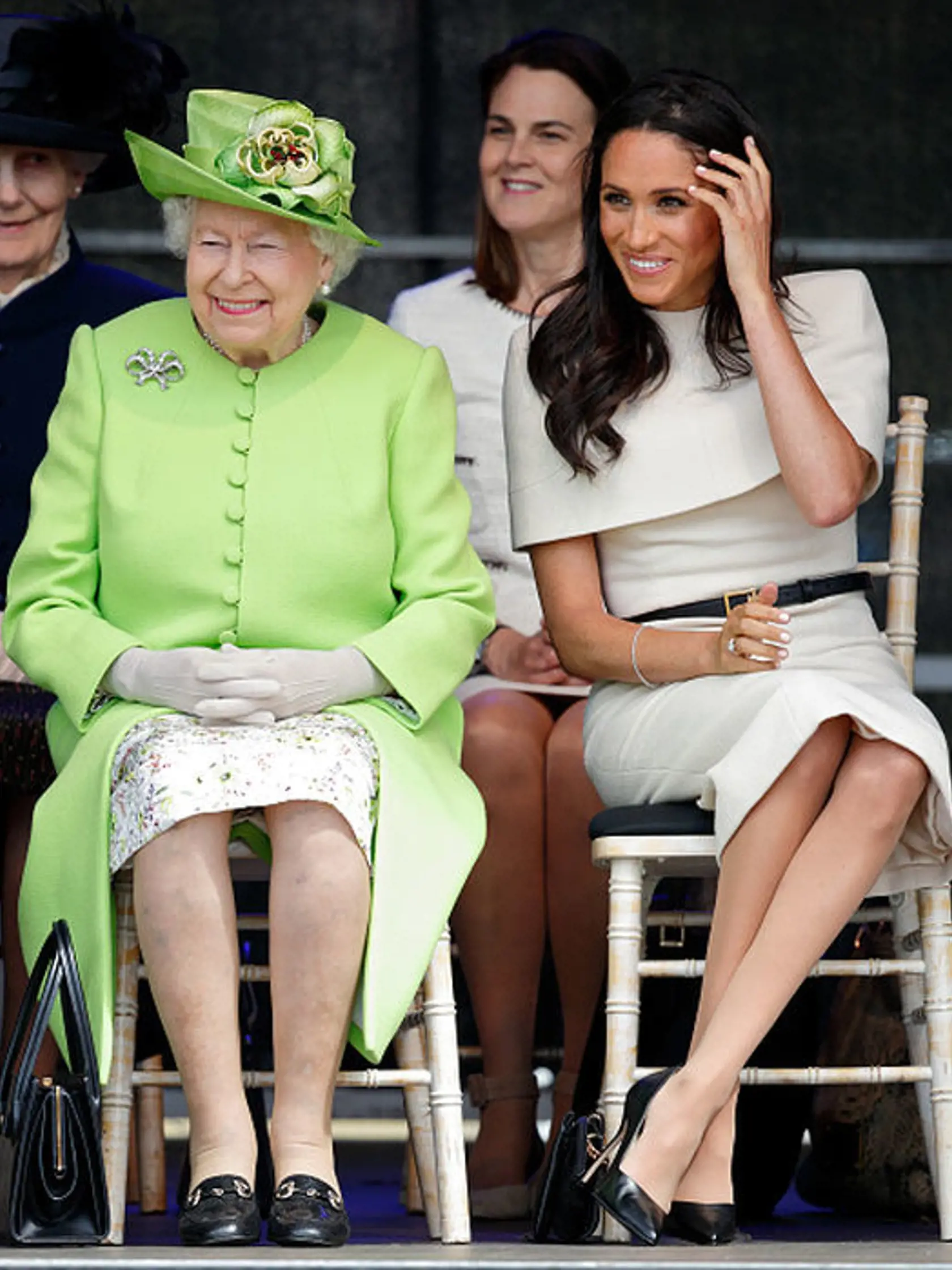 WIDNES, UNITED KINGDOM - JUNE 14: (EMBARGOED FOR PUBLICATION IN UK NEWSPAPERS UNTIL 24 HOURS AFTER CREATE DATE AND TIME) Meghan, Duchess of Sussex and Queen Elizabeth II attend a ceremony to open the new Mersey Gateway Bridge on June 14, 2018 in Widnes, England. Meghan Markle married Prince Harry last month to become The Duchess of Sussex and this is her first engagement with the Queen. During the visit the pair will open a road bridge in Widnes and visit The Storyhouse and Town Hall in Chester.