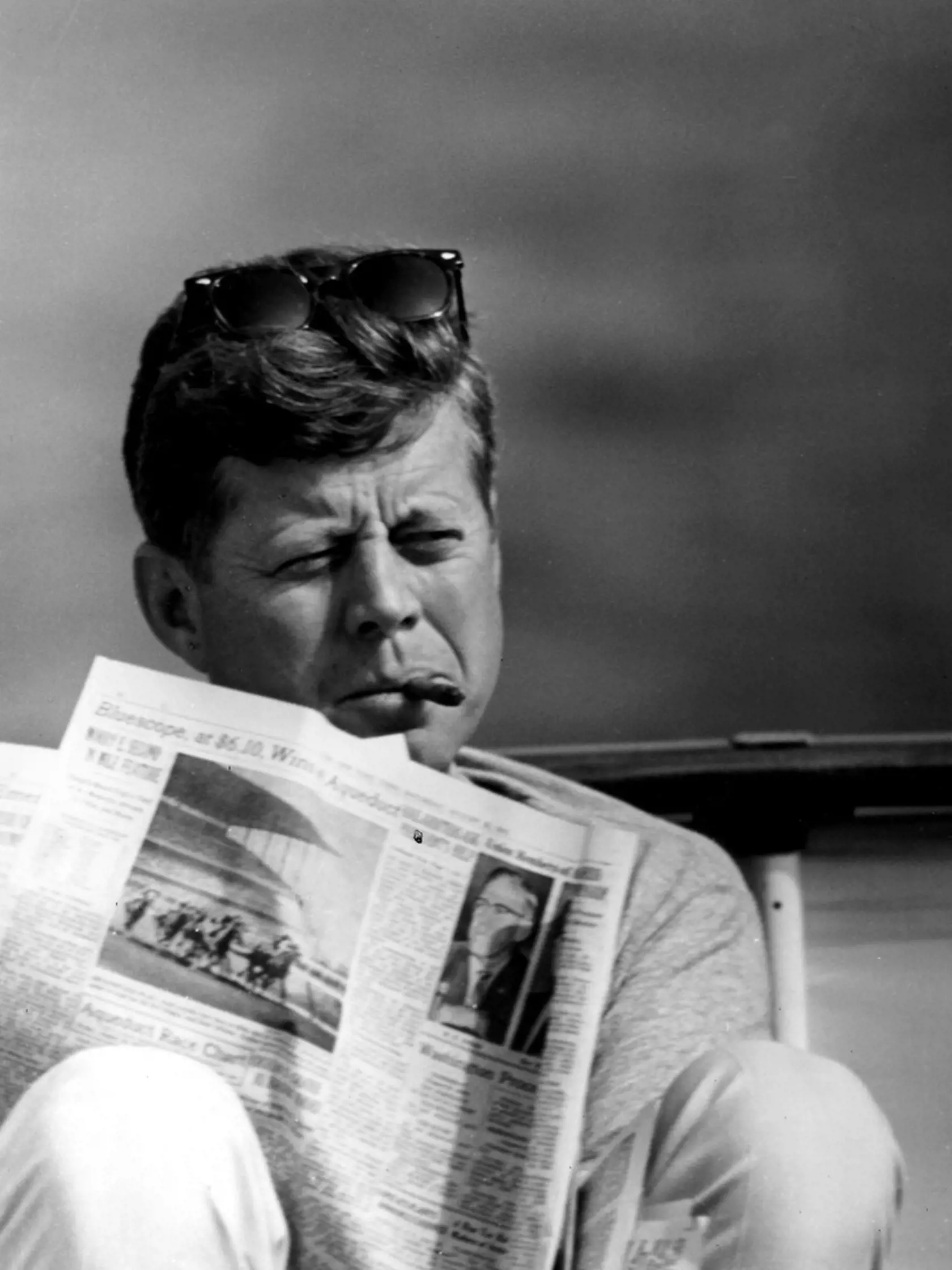 John F. Kennedy, the nation's 35th President, would have turned 100 years old on May 29, 2017. With the centennial anniversary of John F. Kennedy's birth, the former president's legacy is being celebrated across the nation. PICTURED: Aug. 31, 1963 - Hyannis Port, Massachusetts, U.S. - President JOHN F. KENNEDY with a cigar and the New York Times newspaper aboard the family boat the 'Honey Fitz.'., Image: 333240652, License: Rights-managed, Restrictions: , Model Release: no, Credit line: Profimed